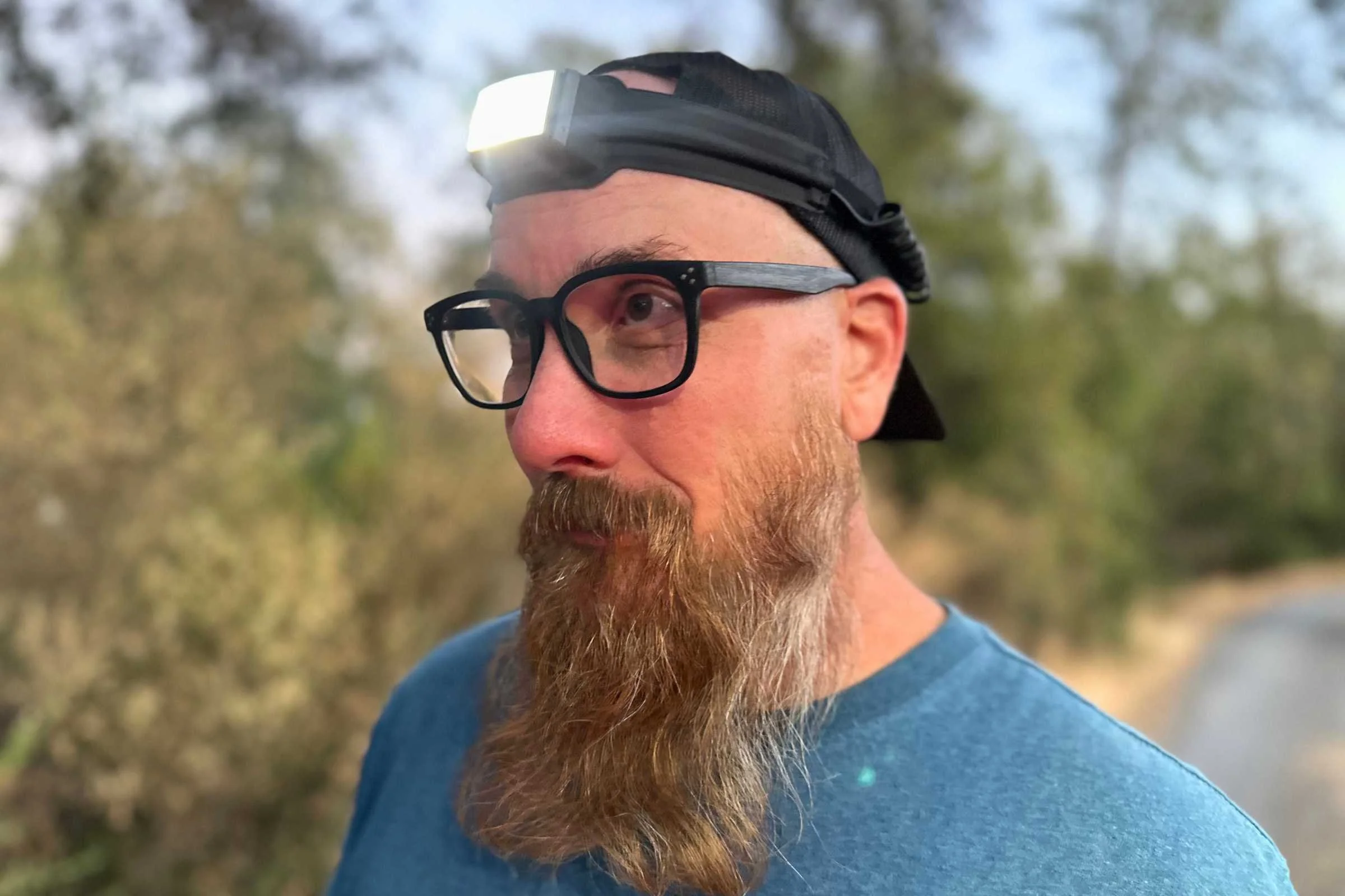 Man with beard wearing the BioLite 800 Pro headlamp