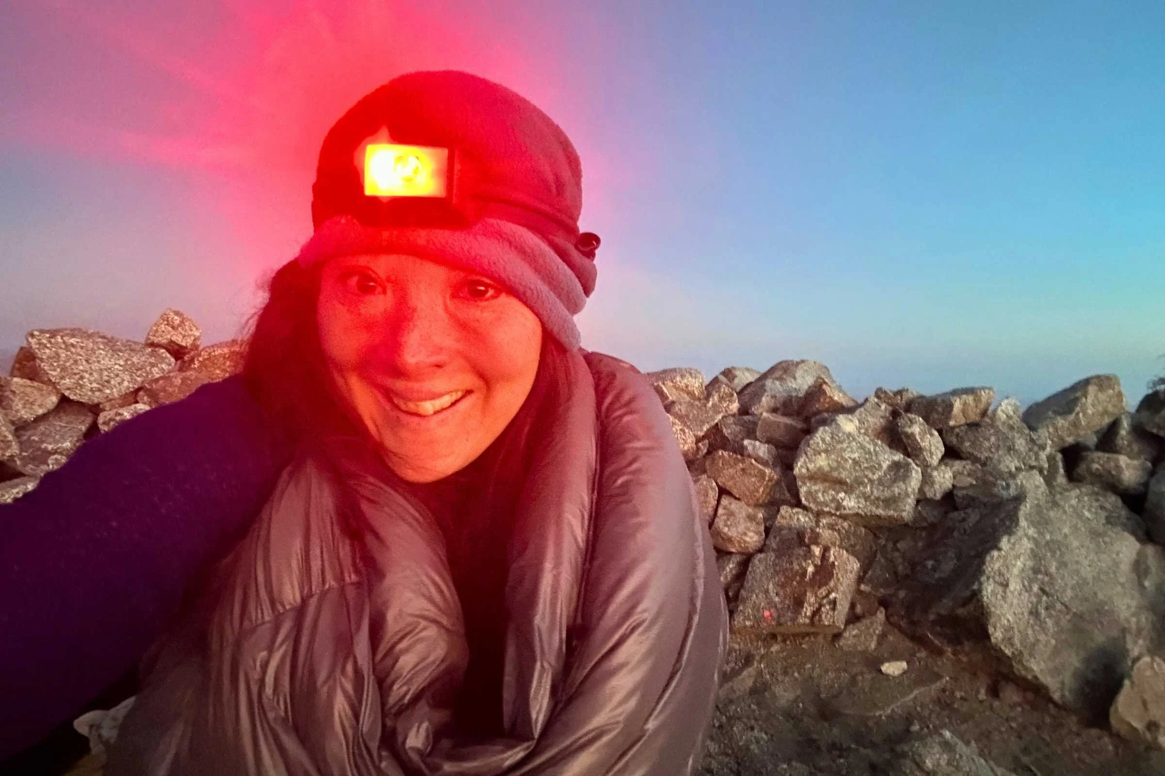 Hiker using the red light on the BioLite 800 Pro