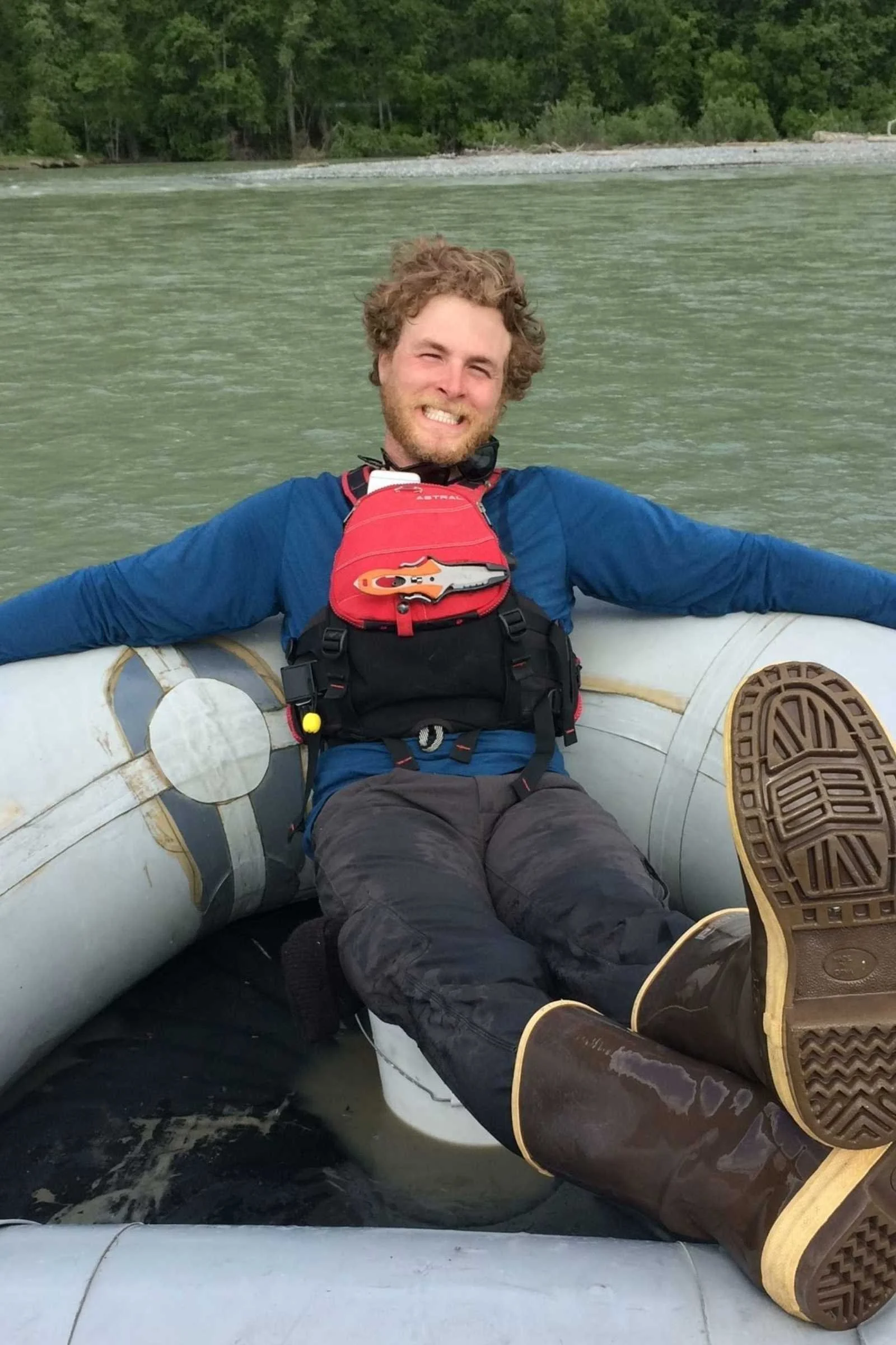 Aaron Henry wearing Astral Greenjacket PFD and XTRATUFLegacy boots while guiding the Chilkat River in Haines, Alaska.