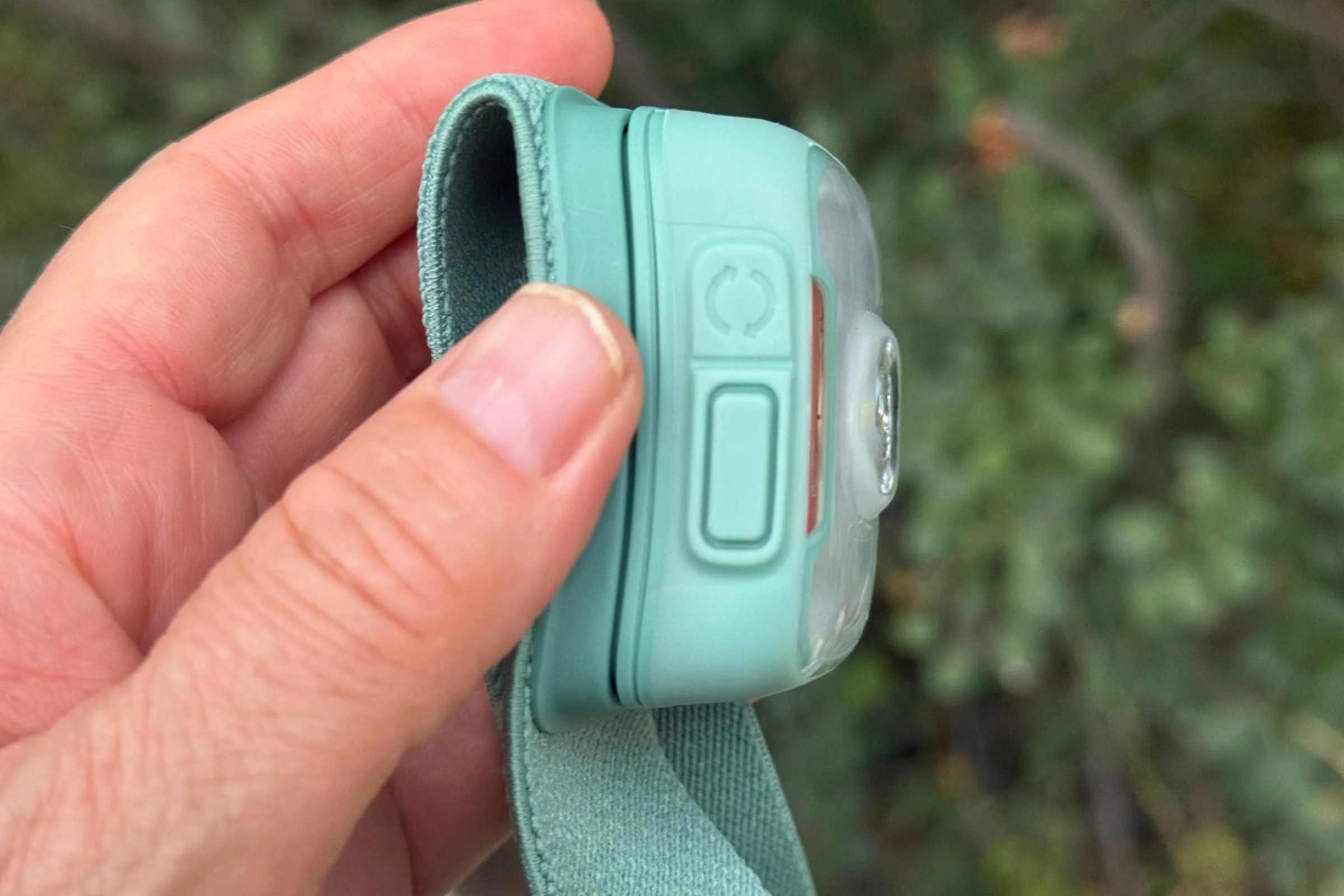 Two buttons on top of BioLite Range 400 headlamp