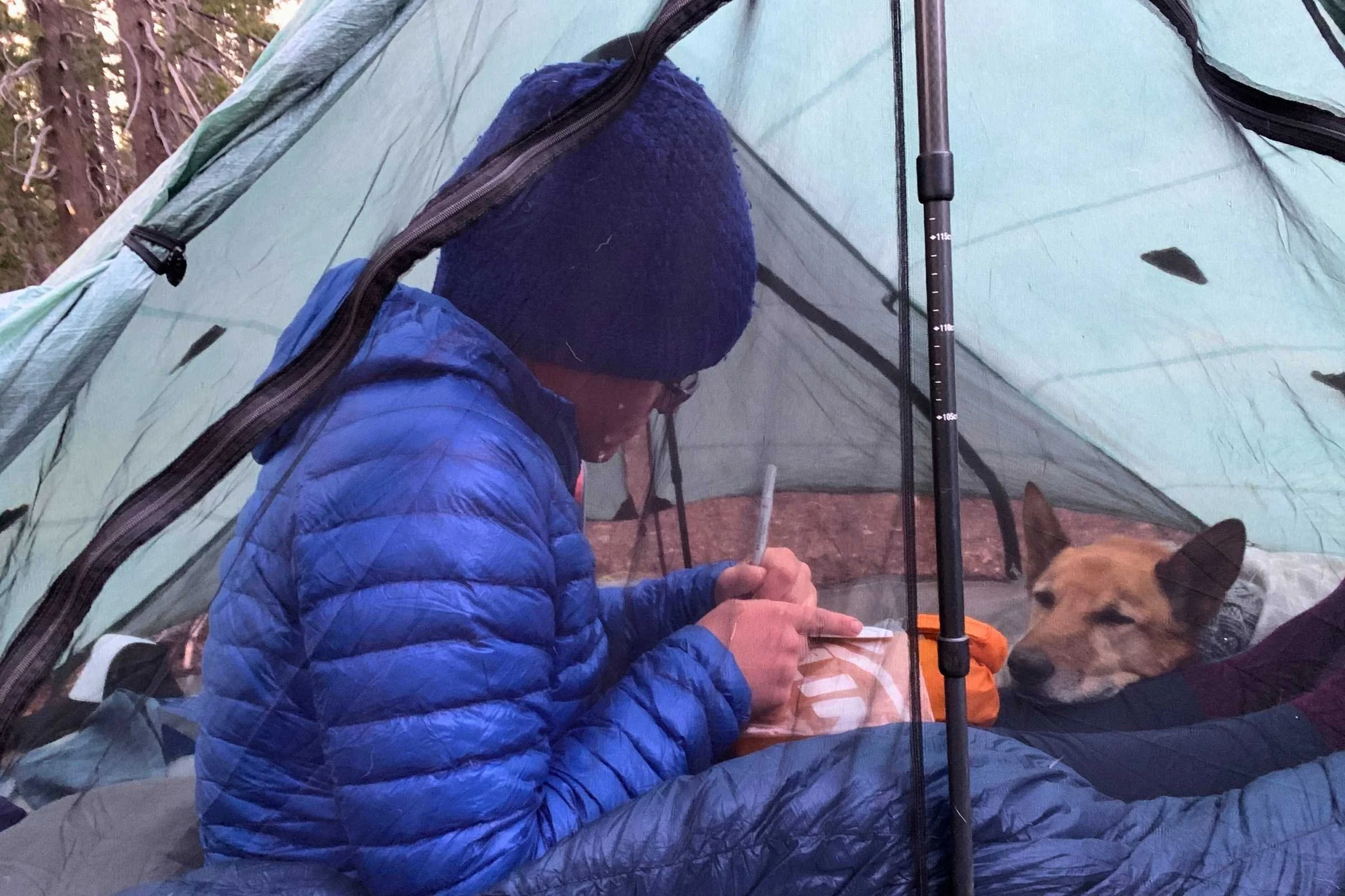 Camping with your dog allows for some one on one cuddle time. Photo courtesy Sara Kruglinski.
