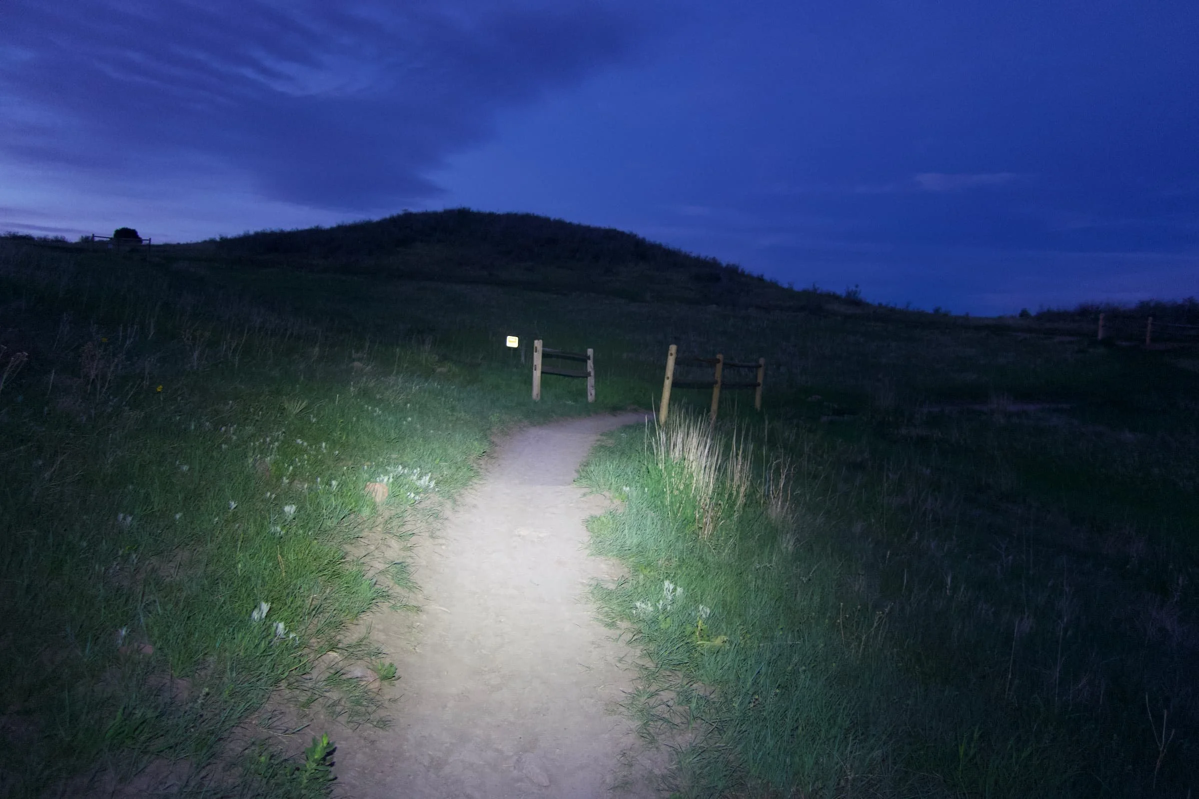   The trail lit up by the Gloworm XS as a handlebar light. Pairing it with the Gloworm X2 Adventure as a helmet light sets you up well for 24-hour races.   Photo by Chris Meehan.    