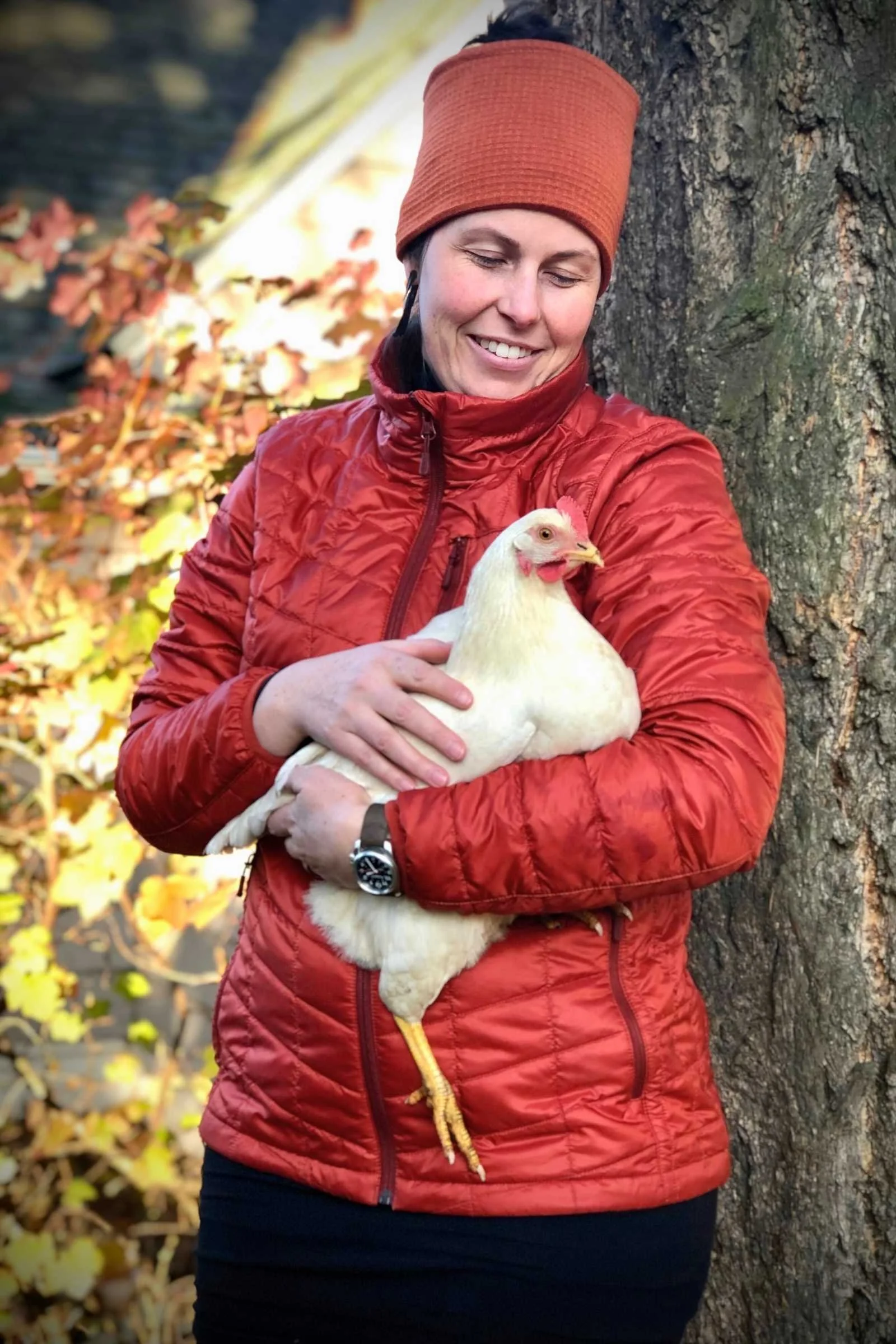   The author of this story holding her pet chicken on a cold fall day while wearing the L.L. Bean Packaway.   Photo by    Emily Haas   