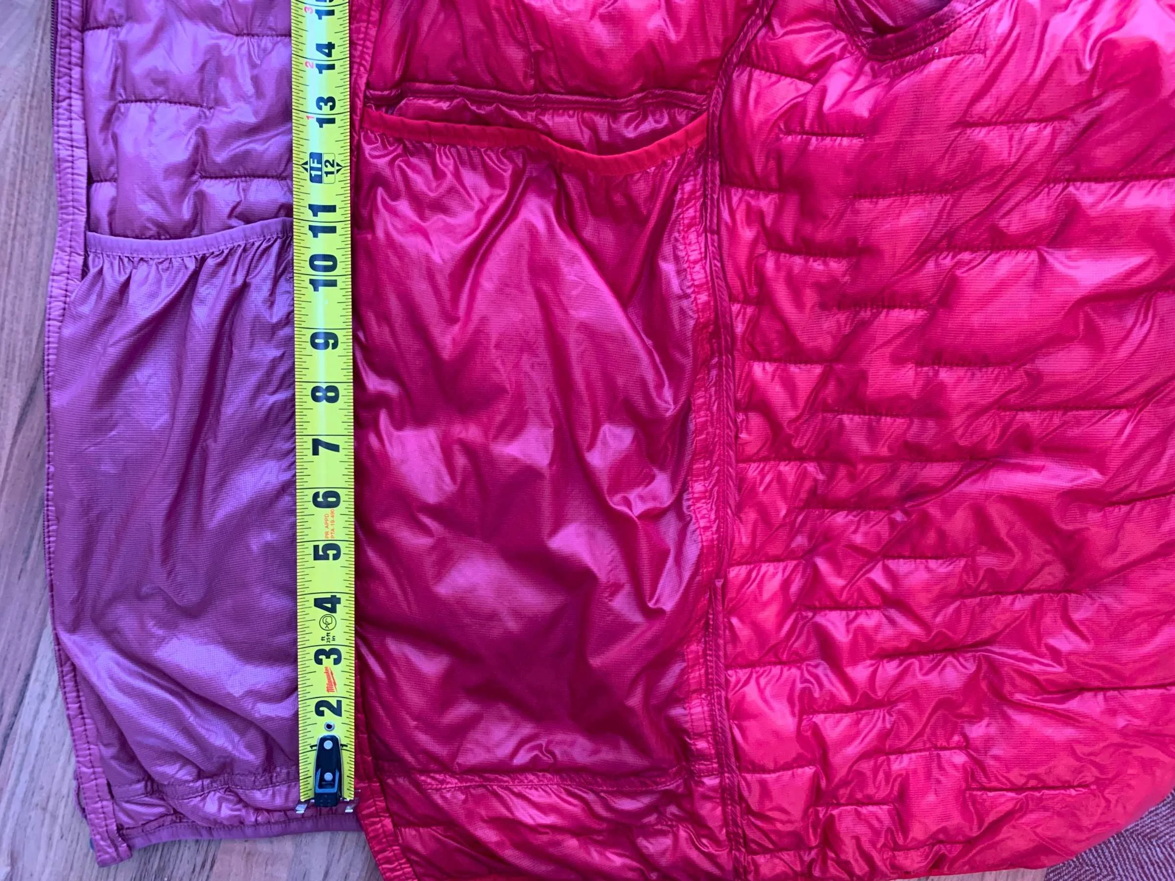   Interior drop-in pockets of the women’s medium (left) and men’s large (right) Micro Puff jackets. The pockets are large enough for your phone, and then some. Elastic at the top keeps contents inside.   Photo courtesy Naomi Hudetz.  
