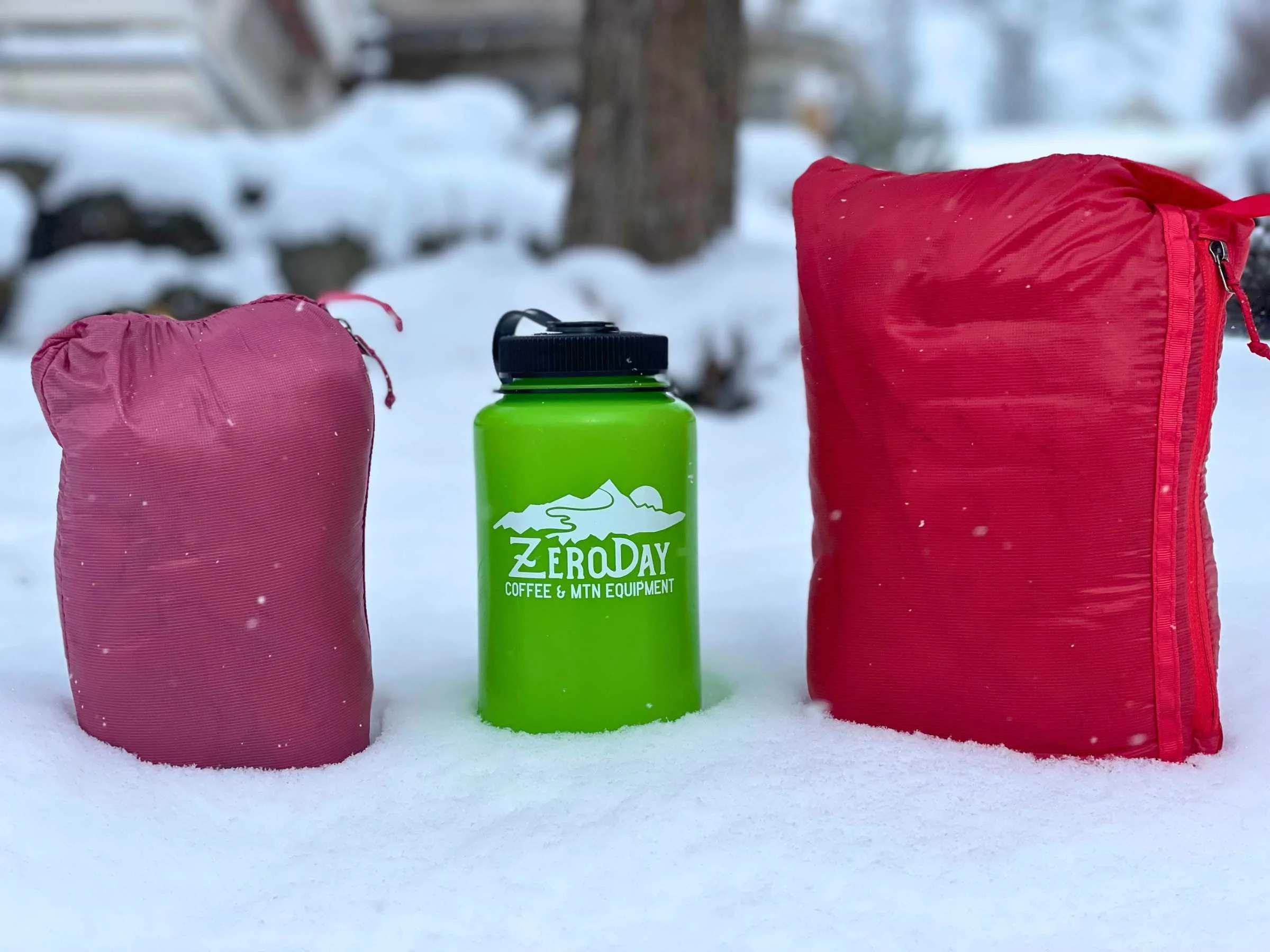   The Patagonia Micro Puff jacket compresses down to less than the size of a water bottle. Women’s is on the left and men’s is on the right.  