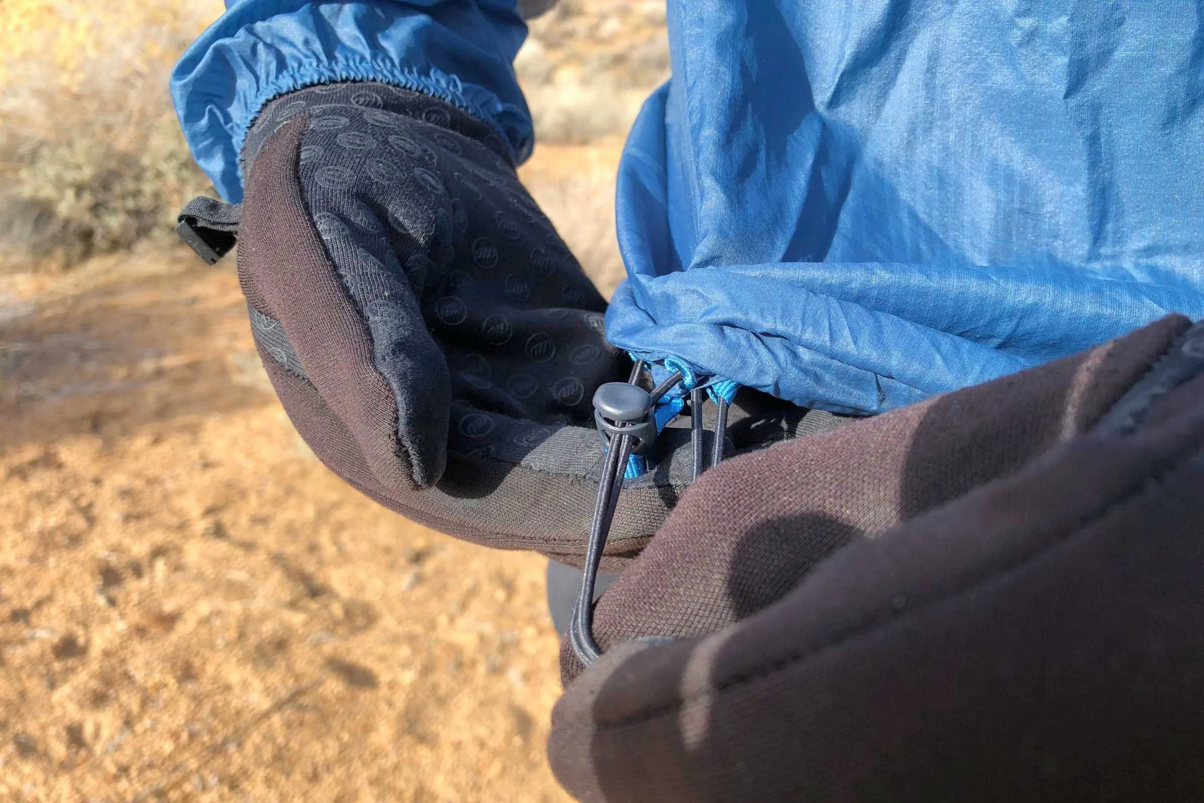   Despite its minimal approach, the Black Diamond Distance shell used larger hardware than most of our jackets. The result? Making adjustments to the jacket when wearing gloves is easier than fiddling with minimalist hardware .  Photo by Sasha Hashem