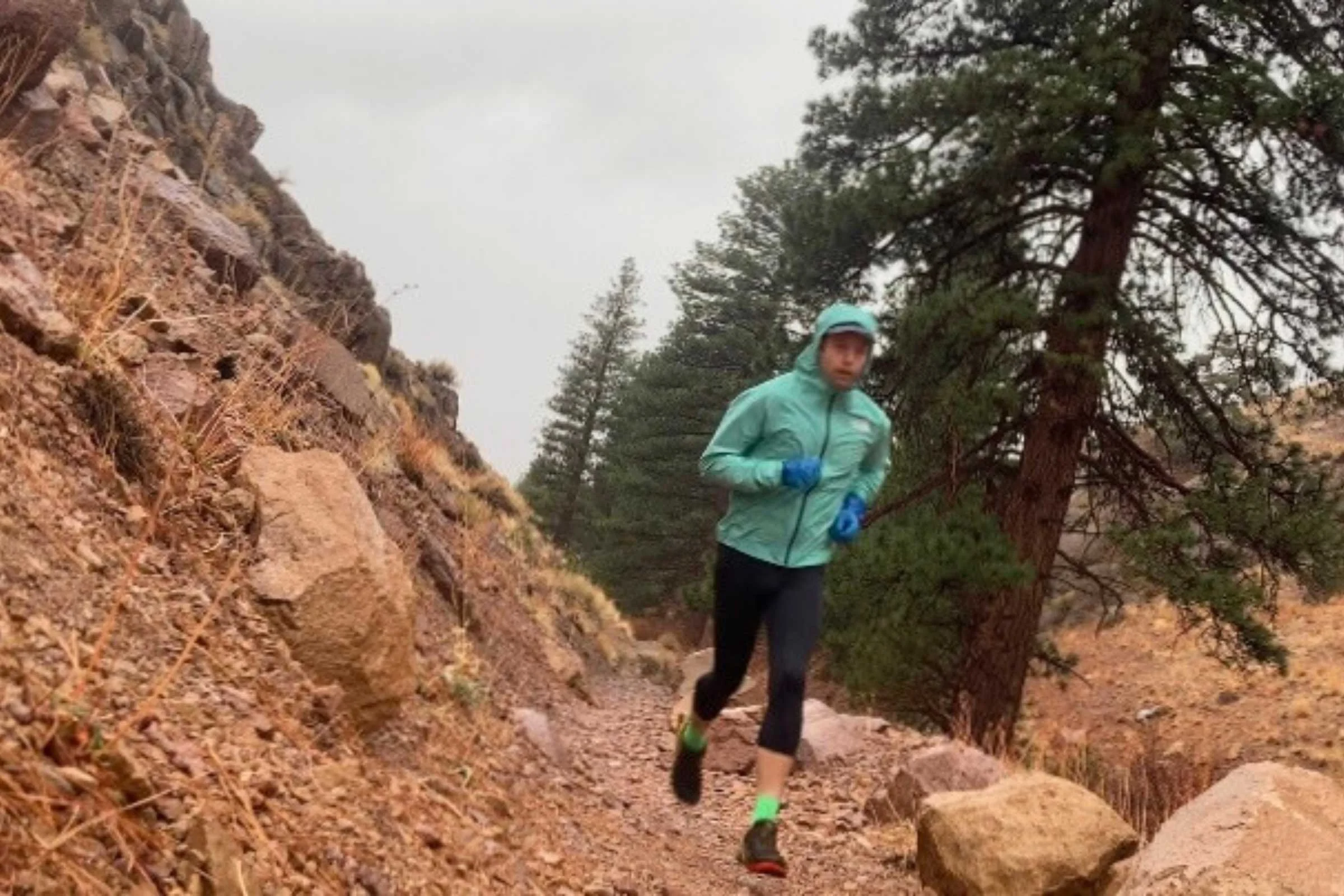   42°F and dumping rain, running alongside the creek and Juniper Pines.   Photo by Trey French  