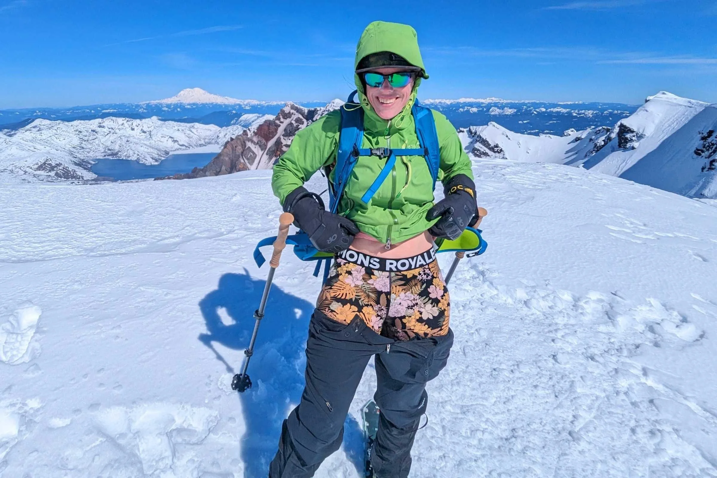   Woman on the top of Mt St Helens wearing the Mons Royale Cascade Merino Flex Legging  