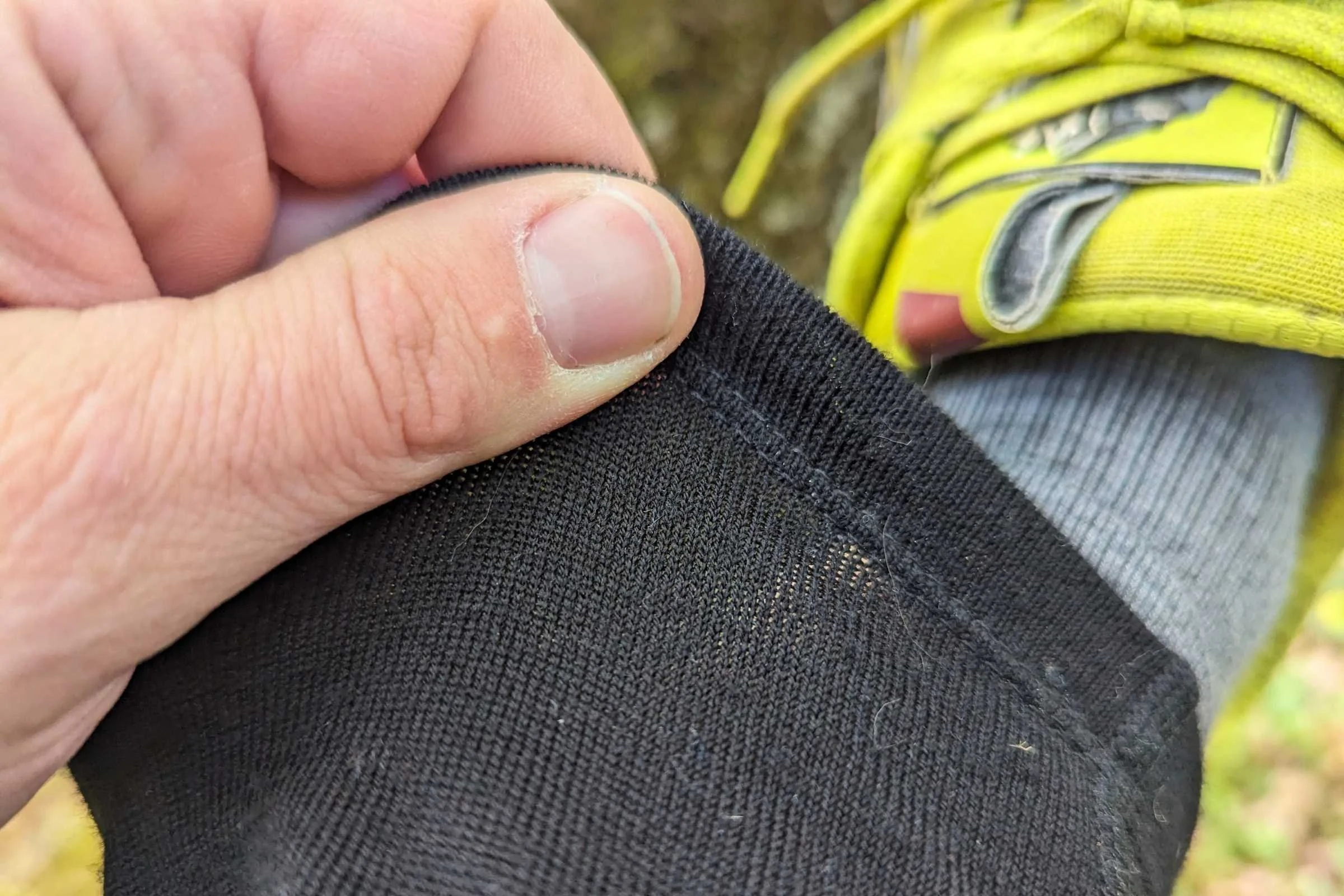   Showing the stretchiness of the ankles on the Icebreaker Merino 260 Tech Thermal leggings  