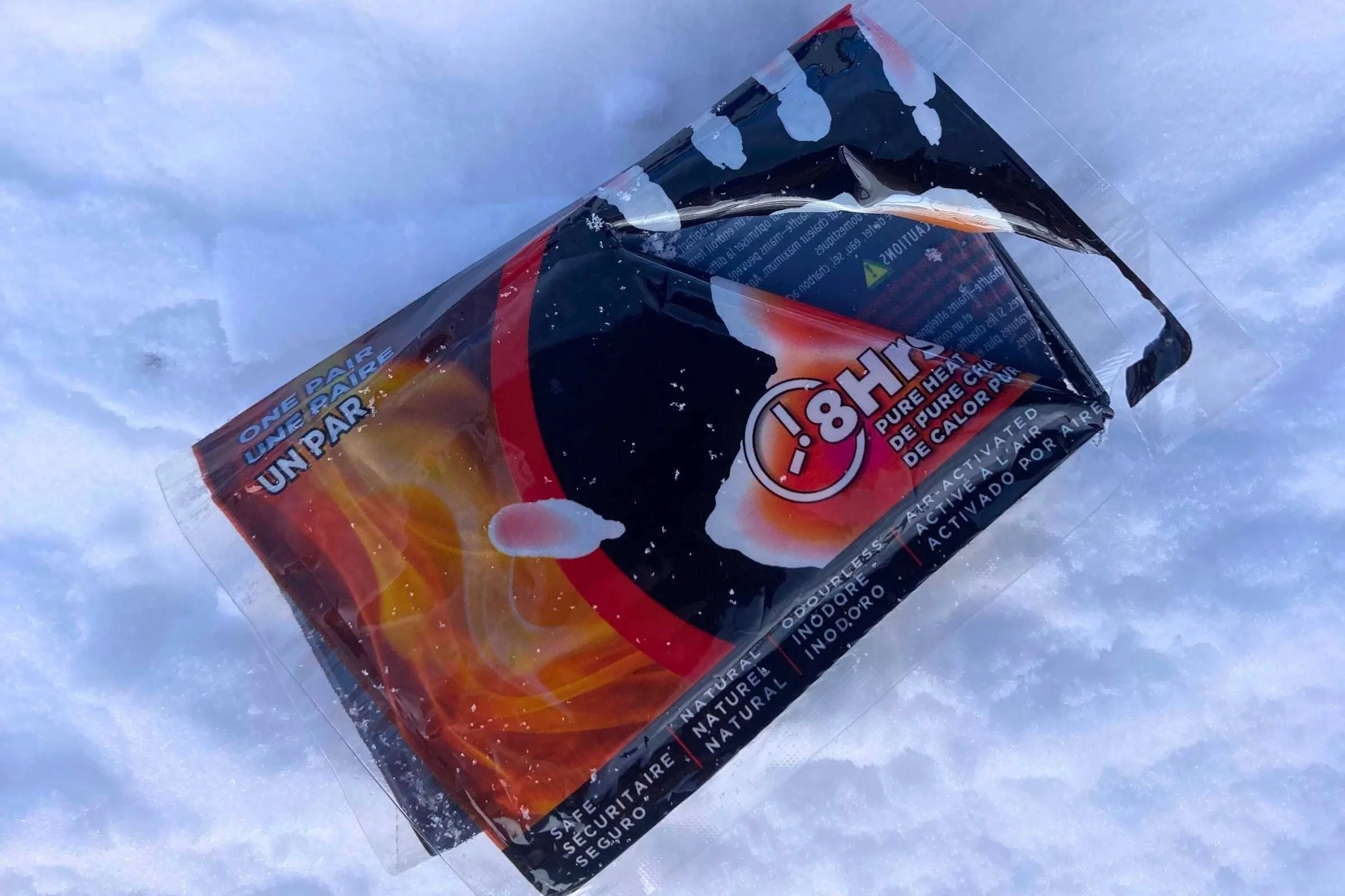   A common site at any resort, dropped disposable hand warmer wrappers littering the ski runs. (We packed this one out after finding it) Heated gloves are an alternative.   Photo by Trey French  