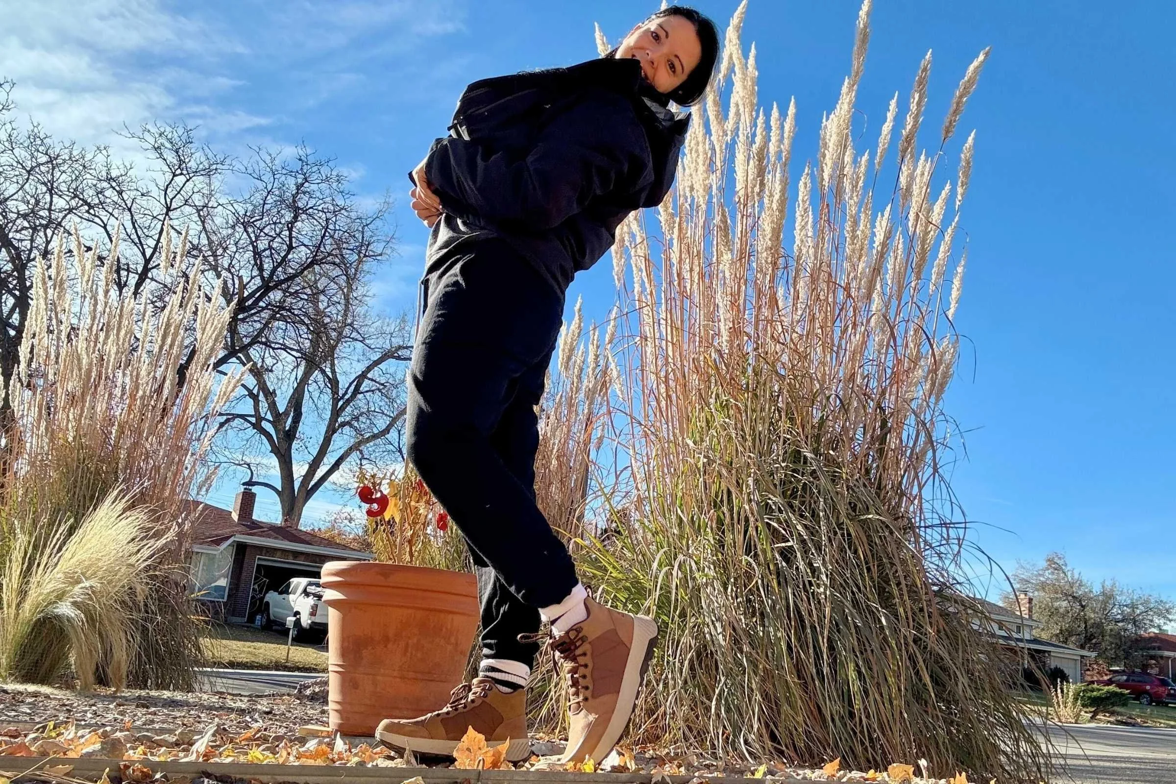  woman wearing black Ibex Nomad Joggers    
