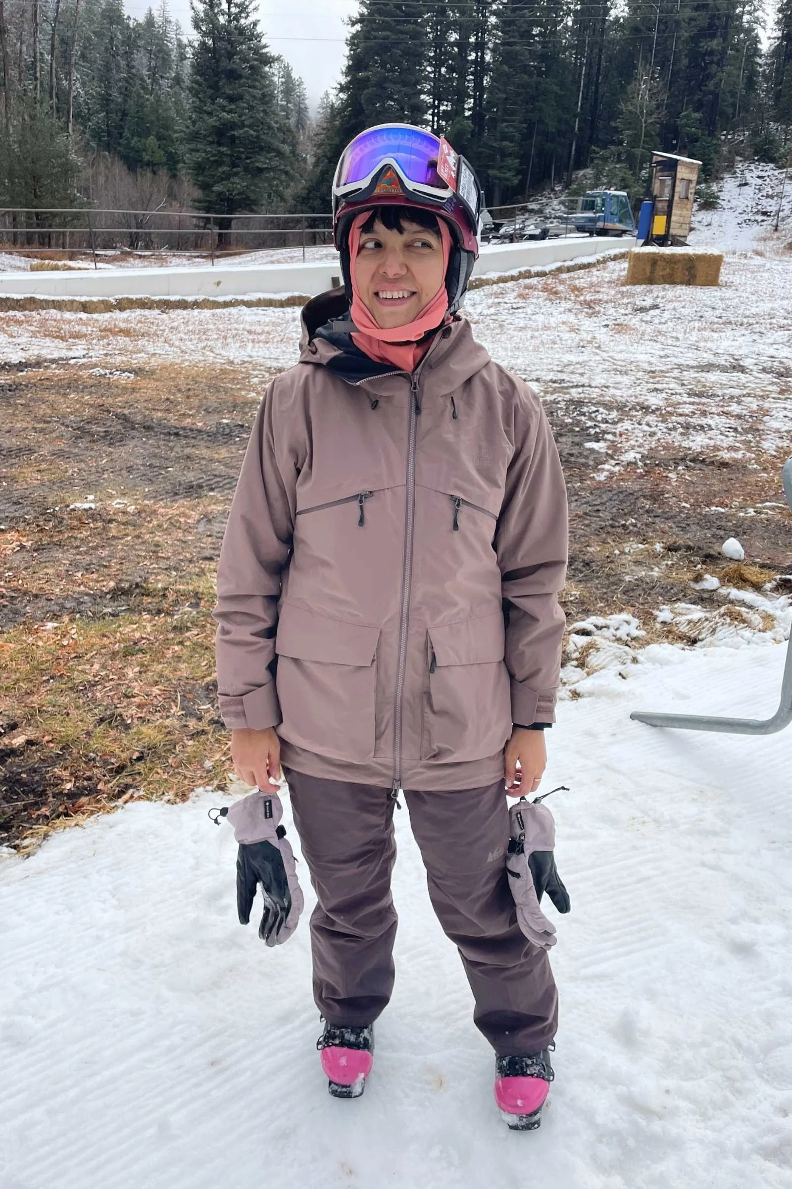  woman in ski gear wearing a purple Picture Organic Clothing U54 JKT 