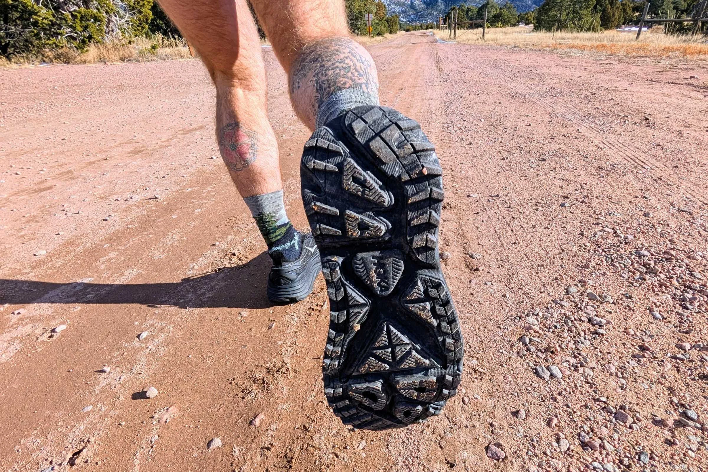   The HOKA Stinson One7 has small lugs on the outsole and a ton of stack height to cushion your feet.  