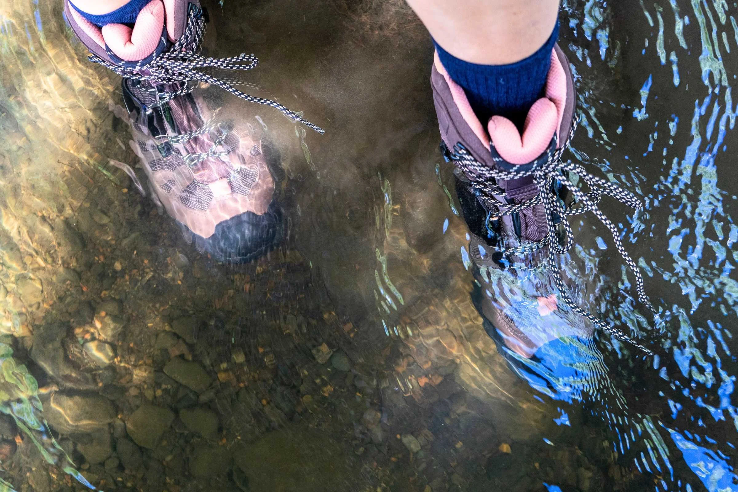   Testing the waterproofness of the Salomon Quest 4 GTX boots by standing in a stream  