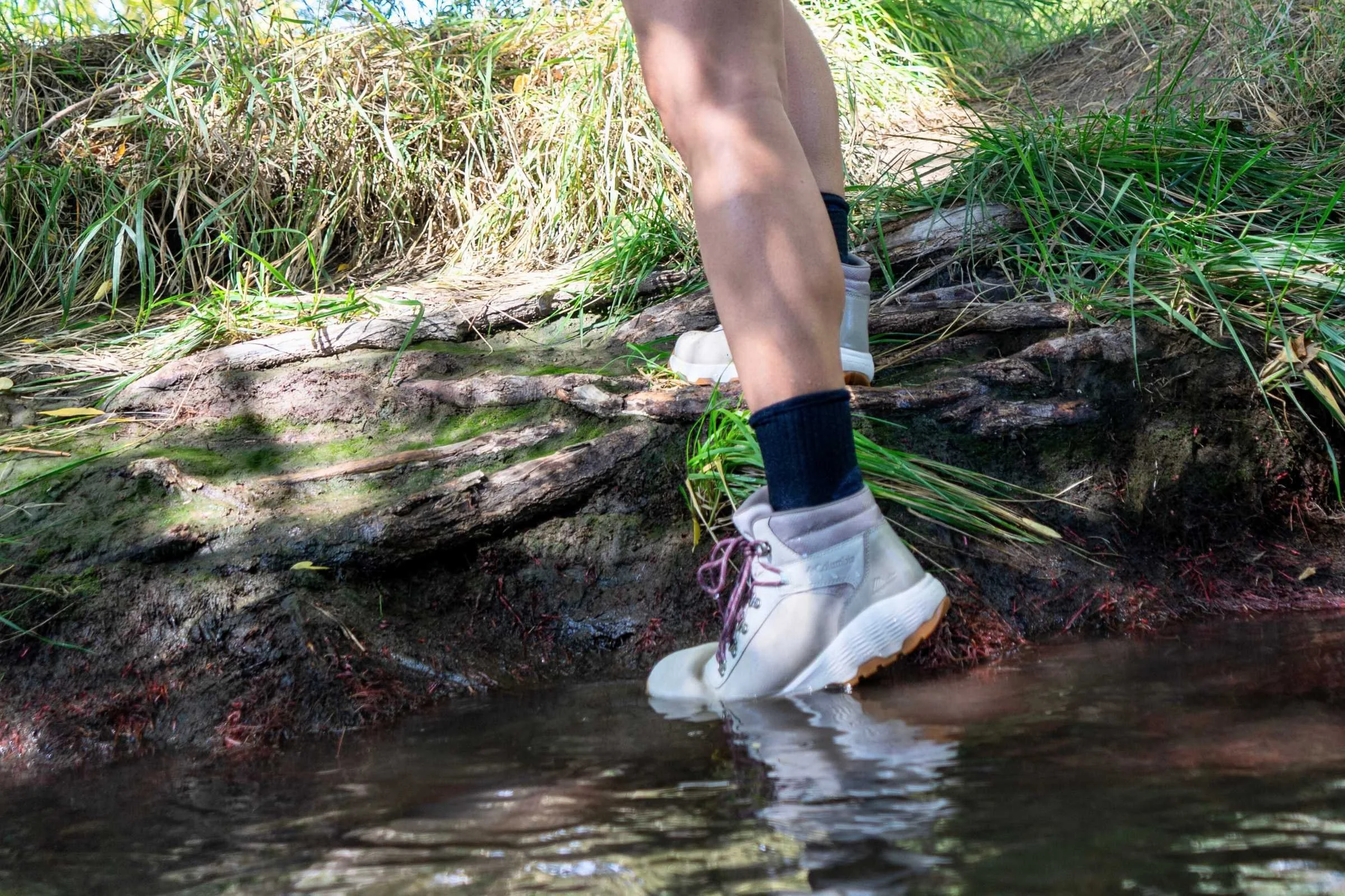   Stepping into a stream to test the waterproofness of the Columbia Newton Wander  