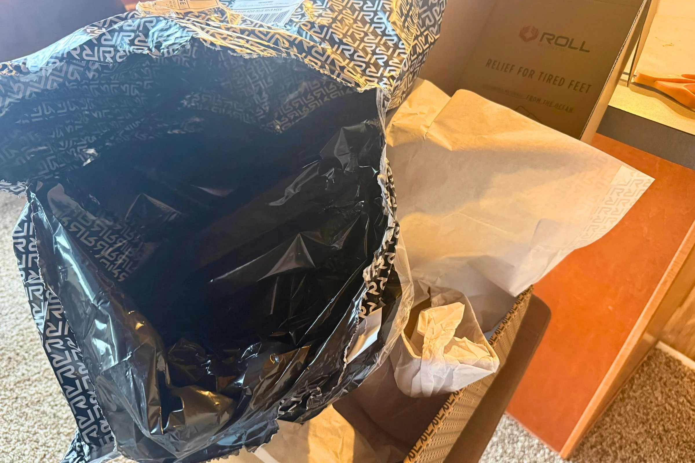   Lots of plastic packaging for the ROLL Recovery Superplush Solace Slides.  