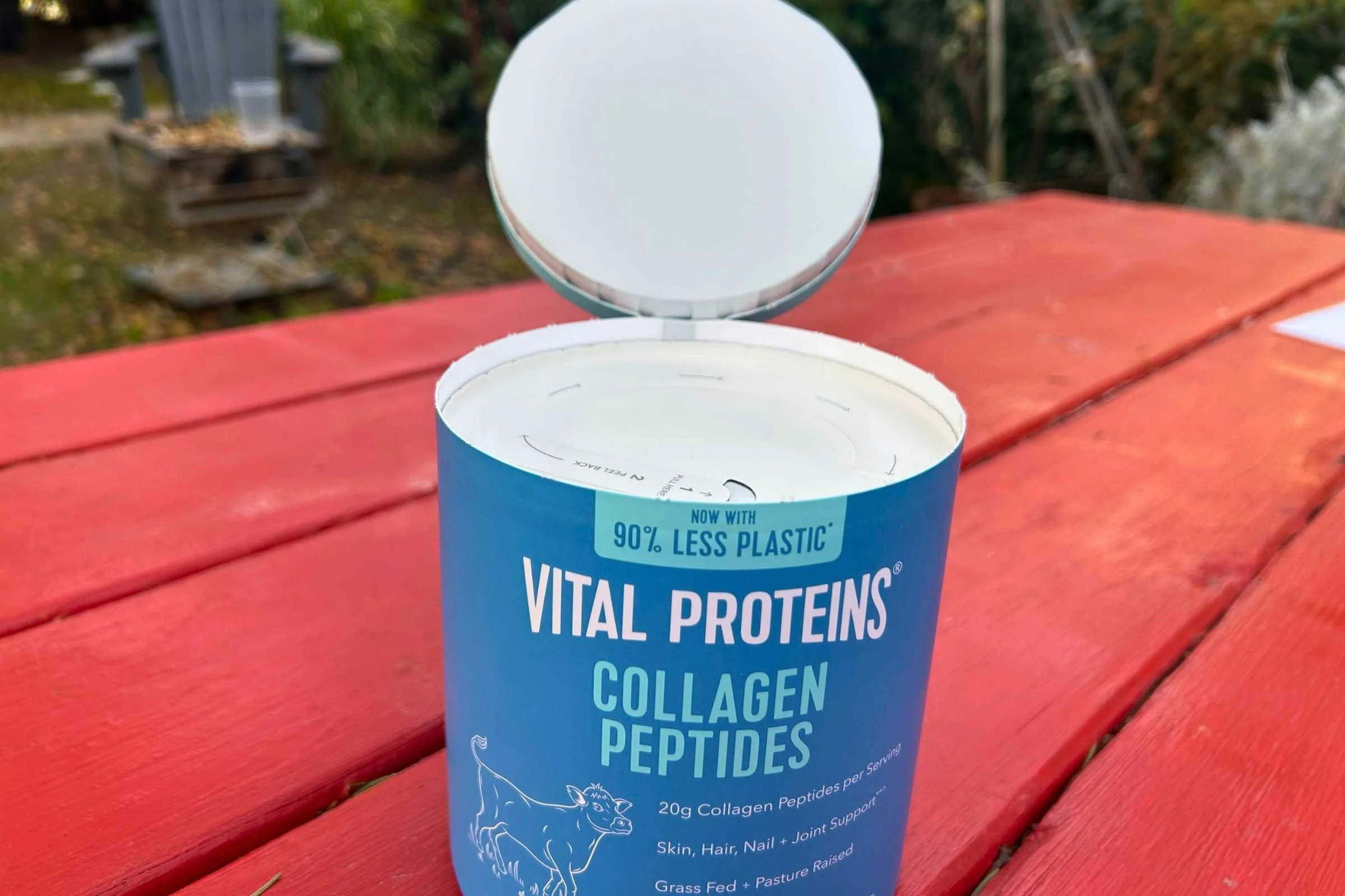   Open Vital Proteins Collagen Peptides container showing powder inside  