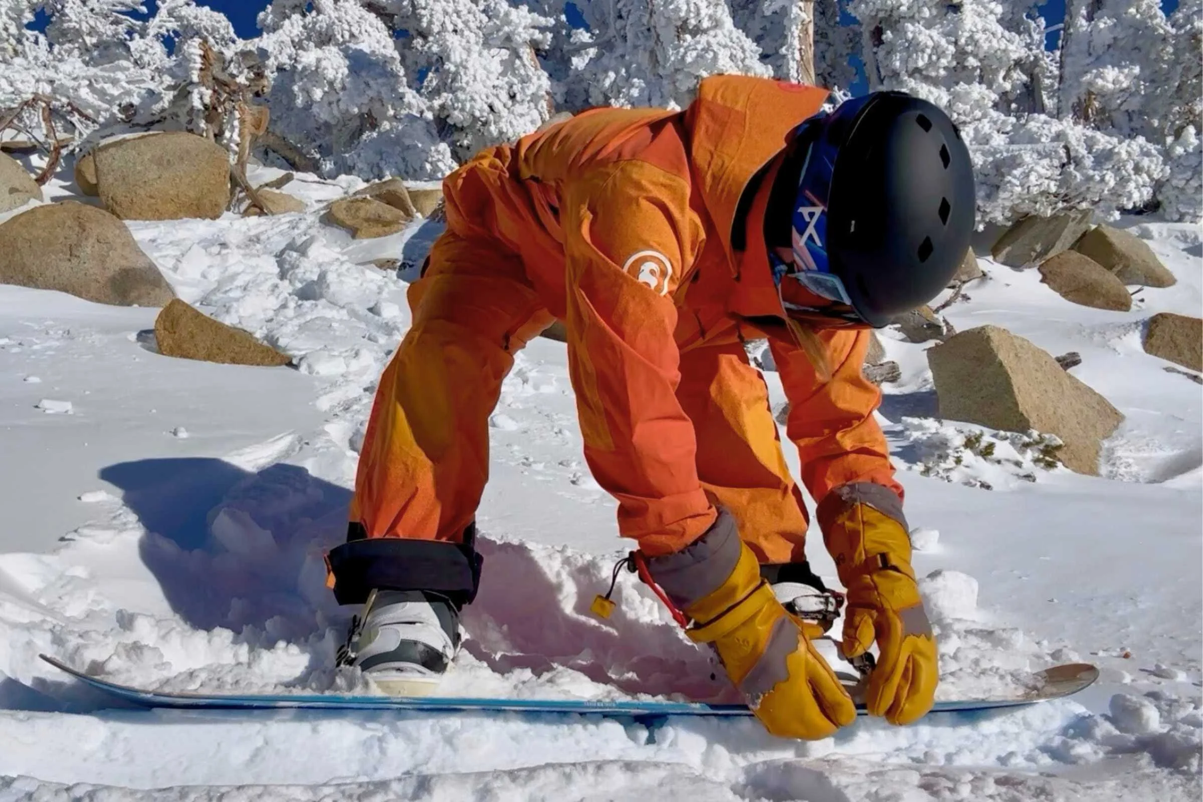   The Give’r Split Mitts were flexible enough that we could wear them while we adjusted our bindings between runs.   Photo courtesy Sara Kruglinski.  