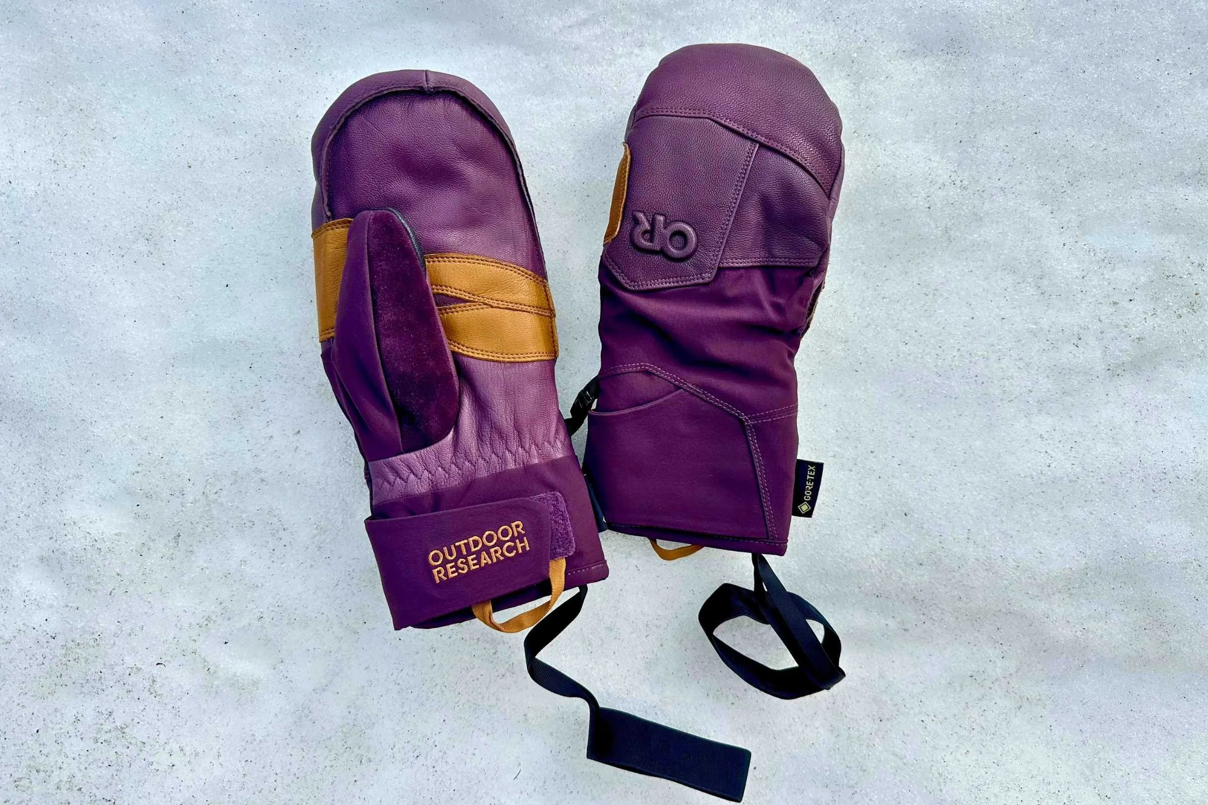   The Outdoor Research GORE-TEX Team Mitts have wrist leashes so you don’t have to worry about dropping one on the lift.   Photo courtesy Sara Kruglinski.  