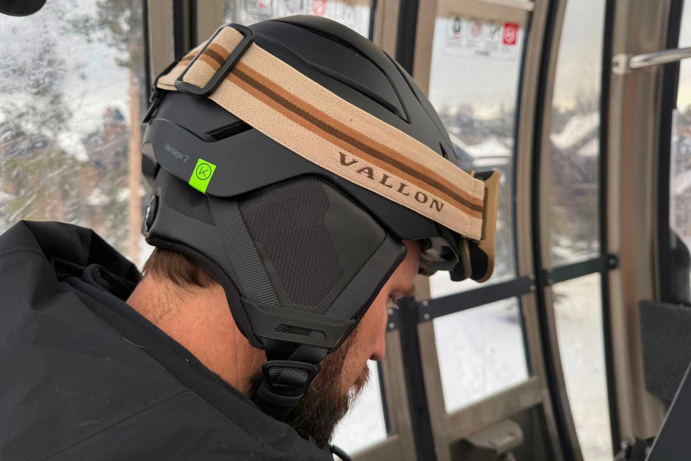   Side rear view of Smith Vantage 2 MIPS helmet with goggles attached  