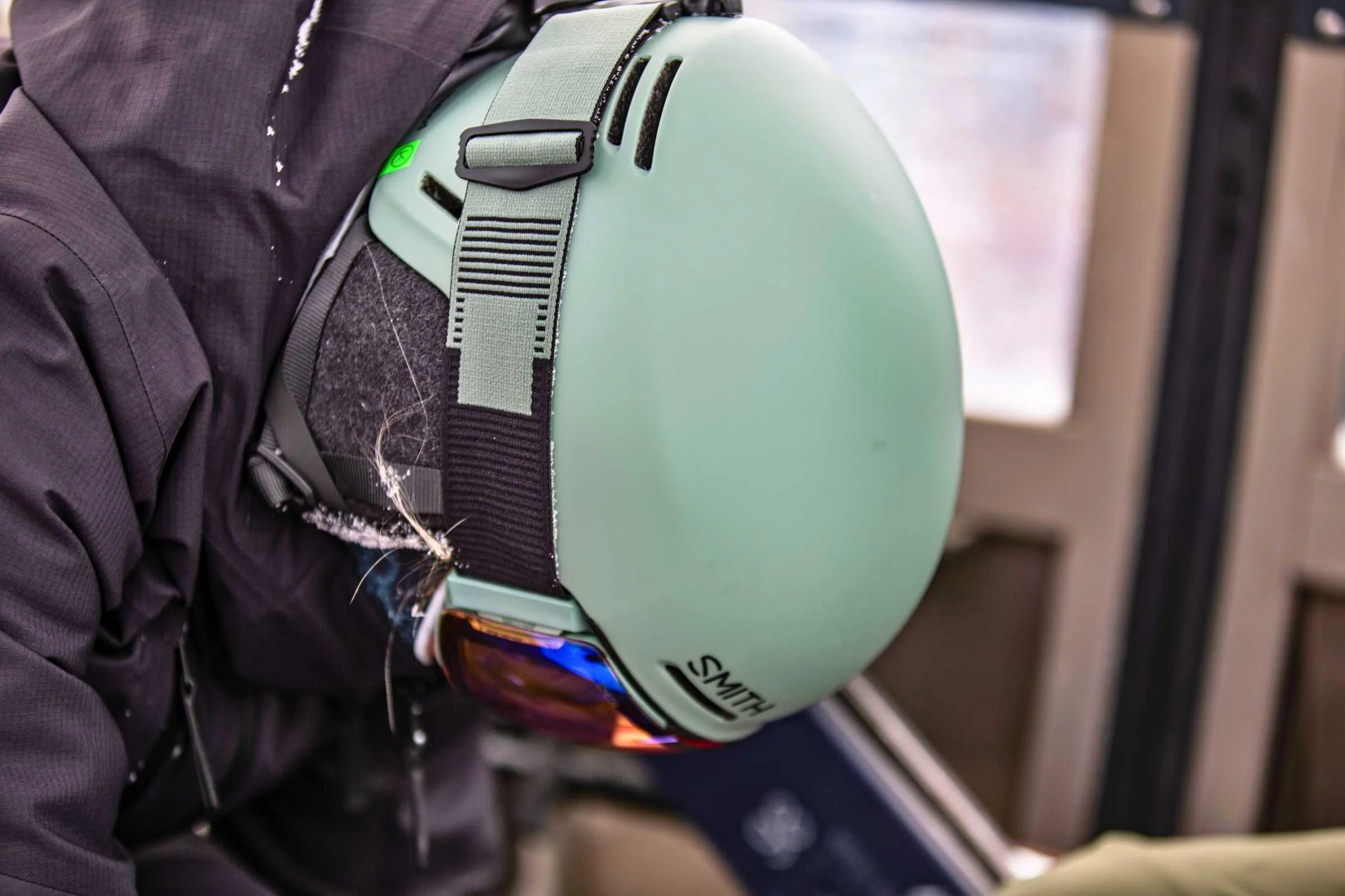   Close-up of Smith Method MIPS helmet side with goggle strap    