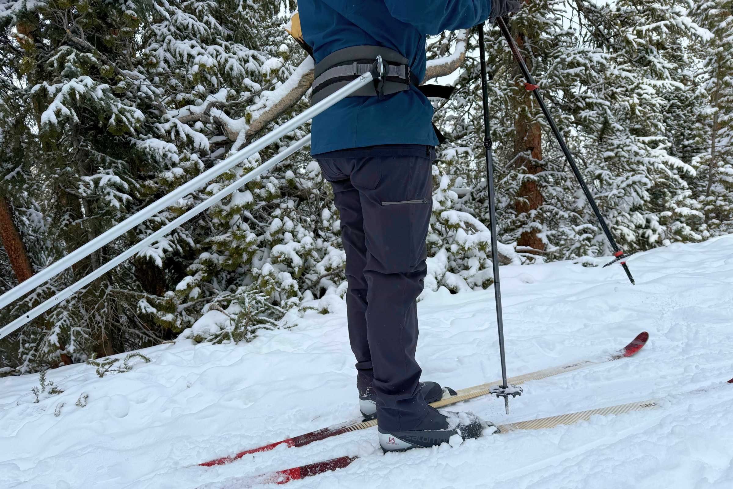   Stio Pinedale pants shown from side while cross-country skiing  