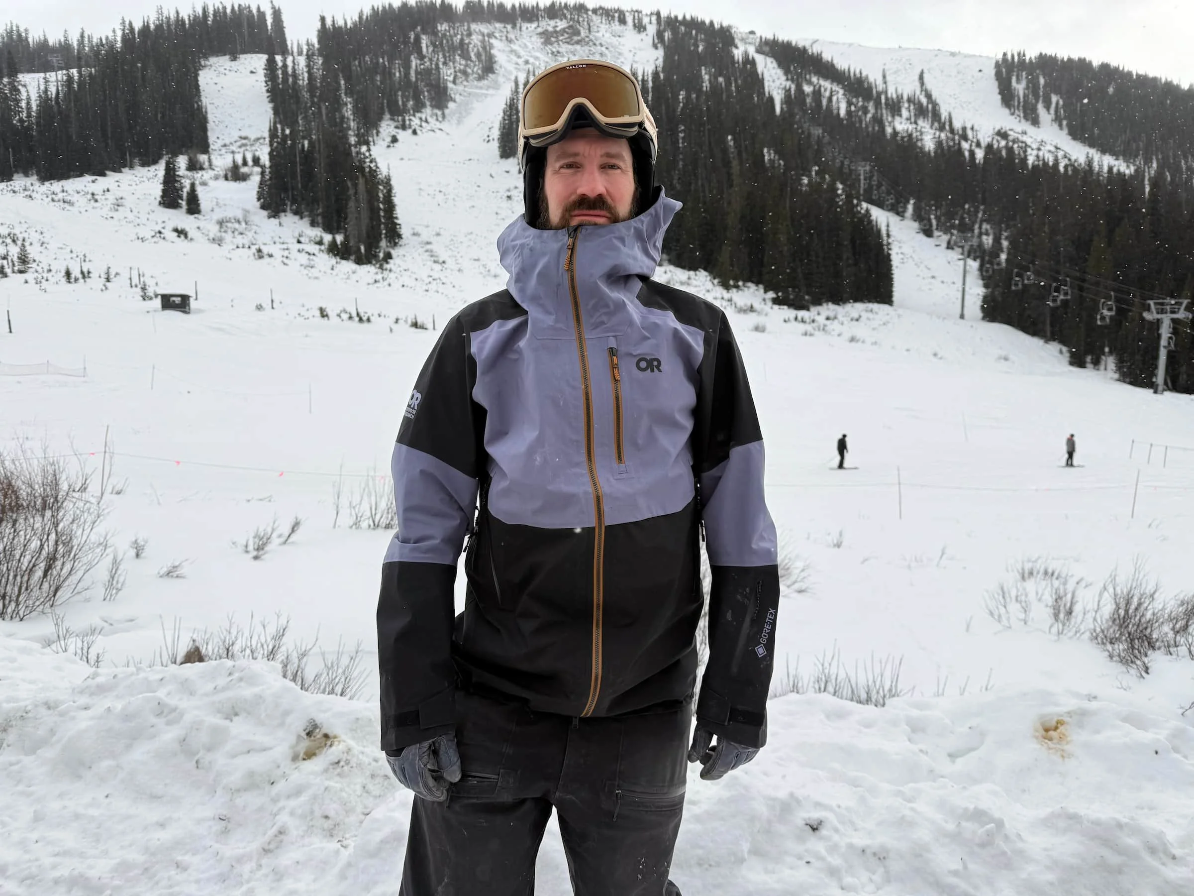   Front view of man wearing Outdoor Research Hemispheres jacket  