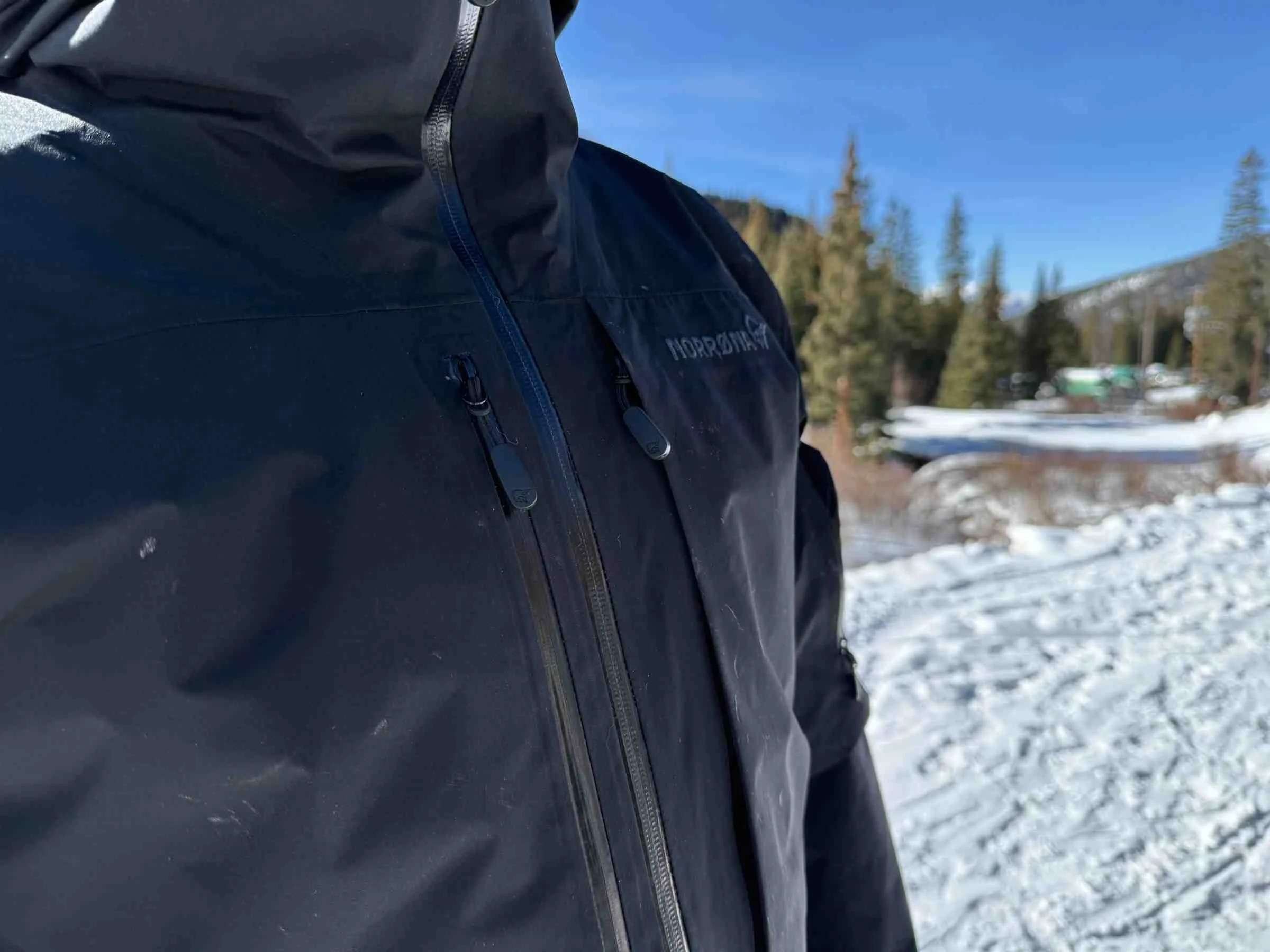   Close-up of Norrona Lofoten GORE-TEX Insulated jacket front zipper  