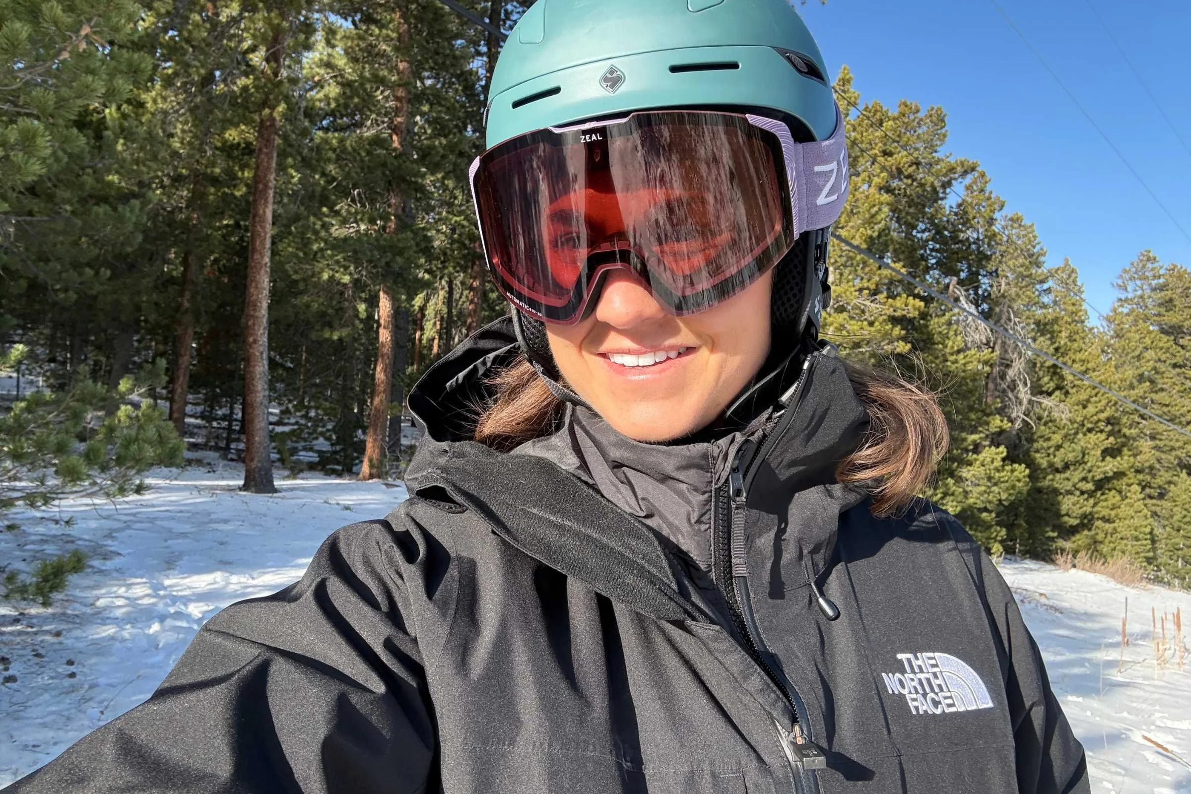   Woman wearing The North Face ThermoBall Snow Triclimate jacket  