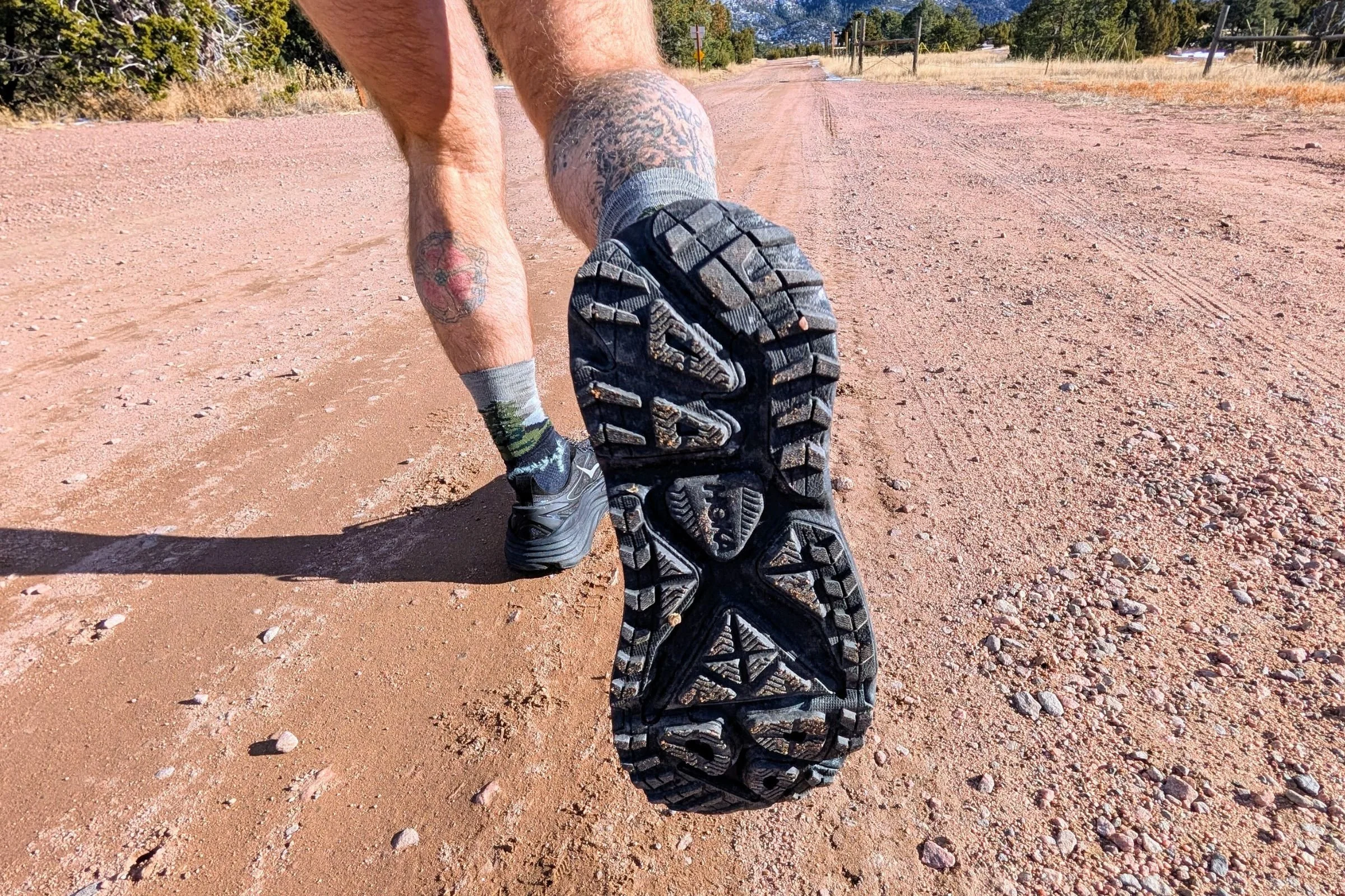  The HOKA Stinson One7 has small lugs on the outsole and a ton of stack height to cushion your feet.  