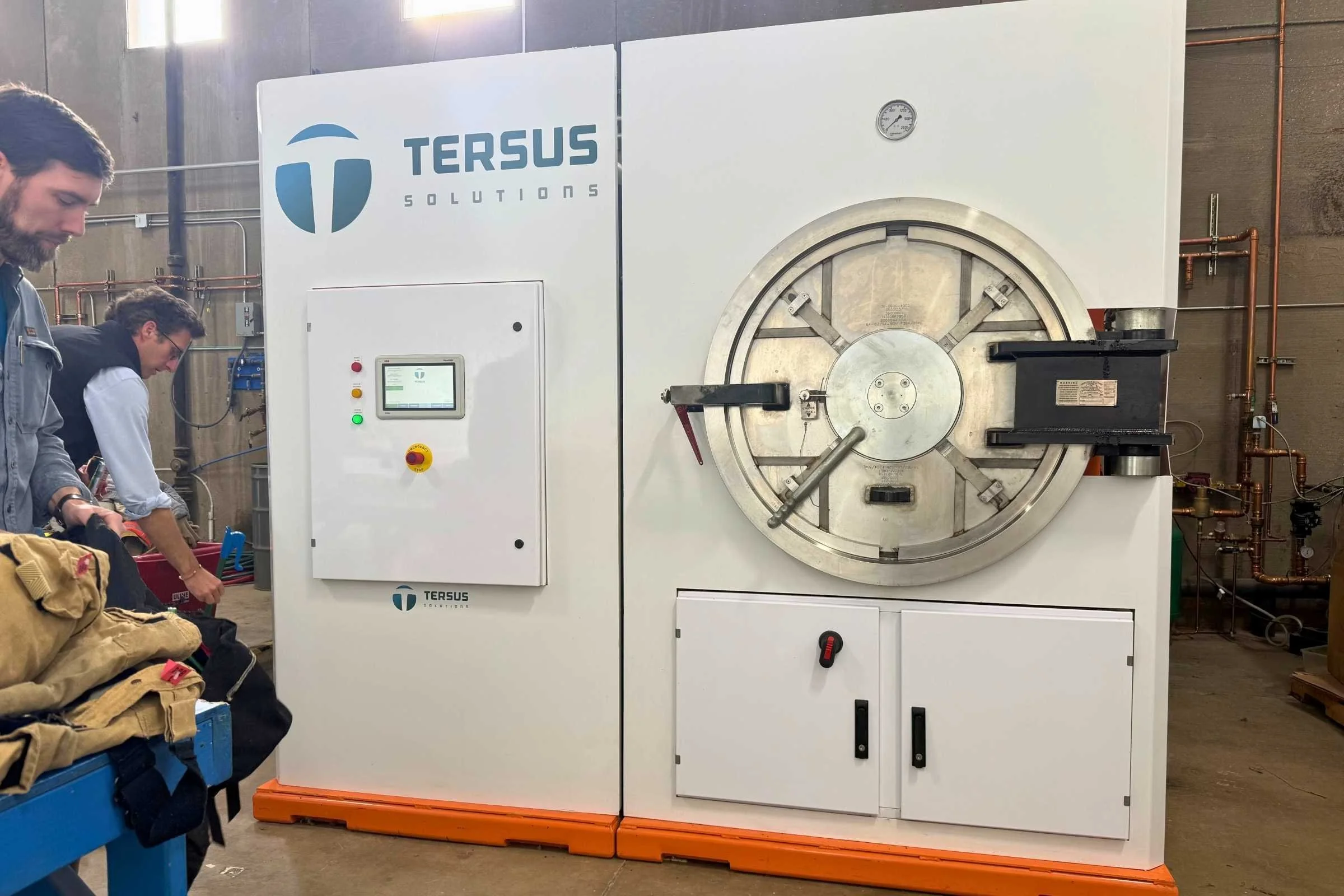   The Tersus Solutions CO₂ cleaning system used to restore outdoor gear without water. The machine uses highly pressurized carbon dioxide to remove dirt, contaminants, and residues from apparel and equipment before repair or resale.  