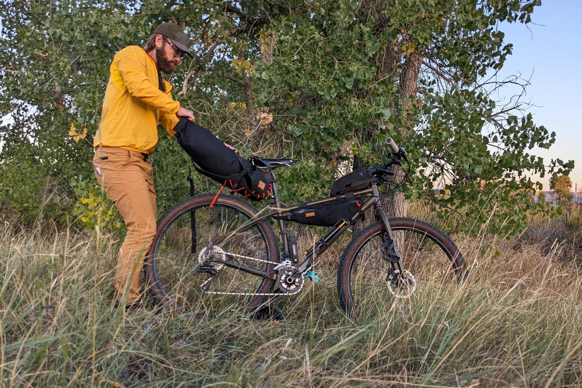   Loading up the Restrap saddle bag on a bikepacking trip.  
