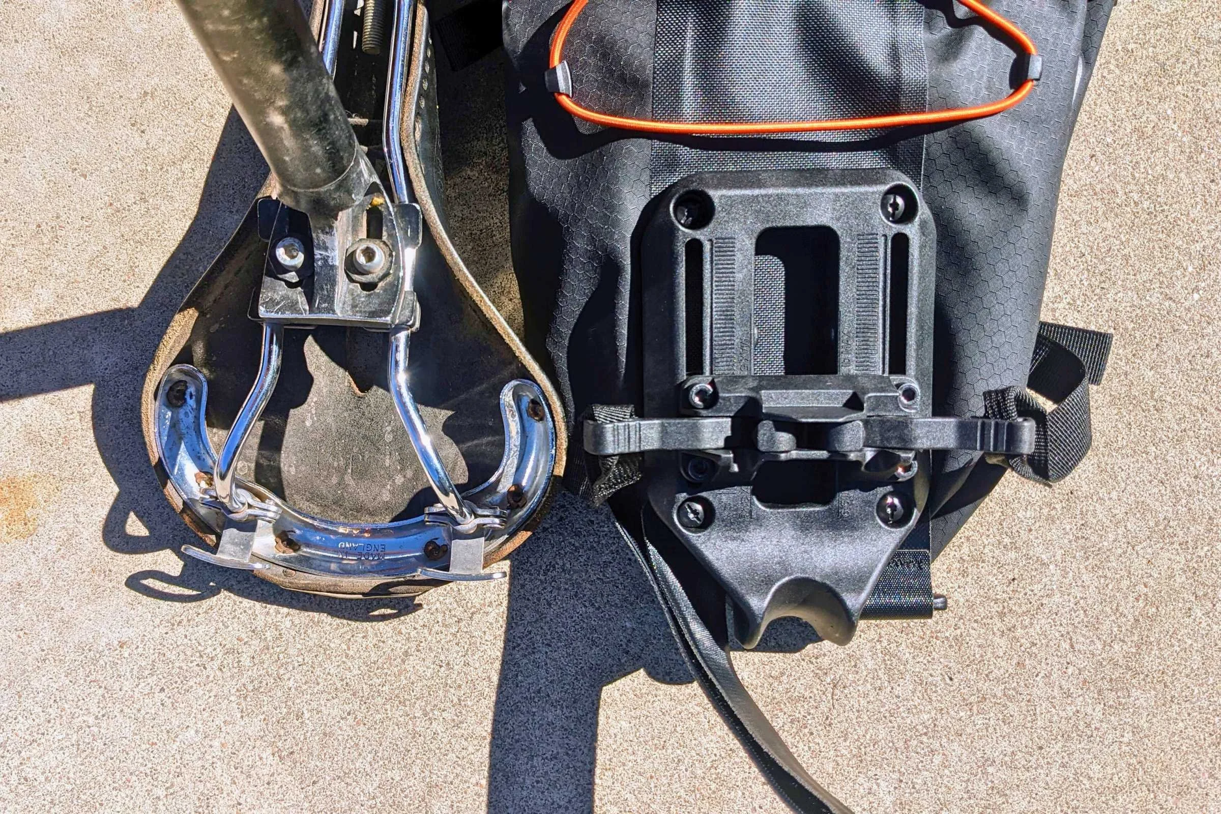   If your saddle rails don't flair out like they do on the Brooks Professional, as seen here, the Ortlieb Seat Peak QR will work on your saddle.  