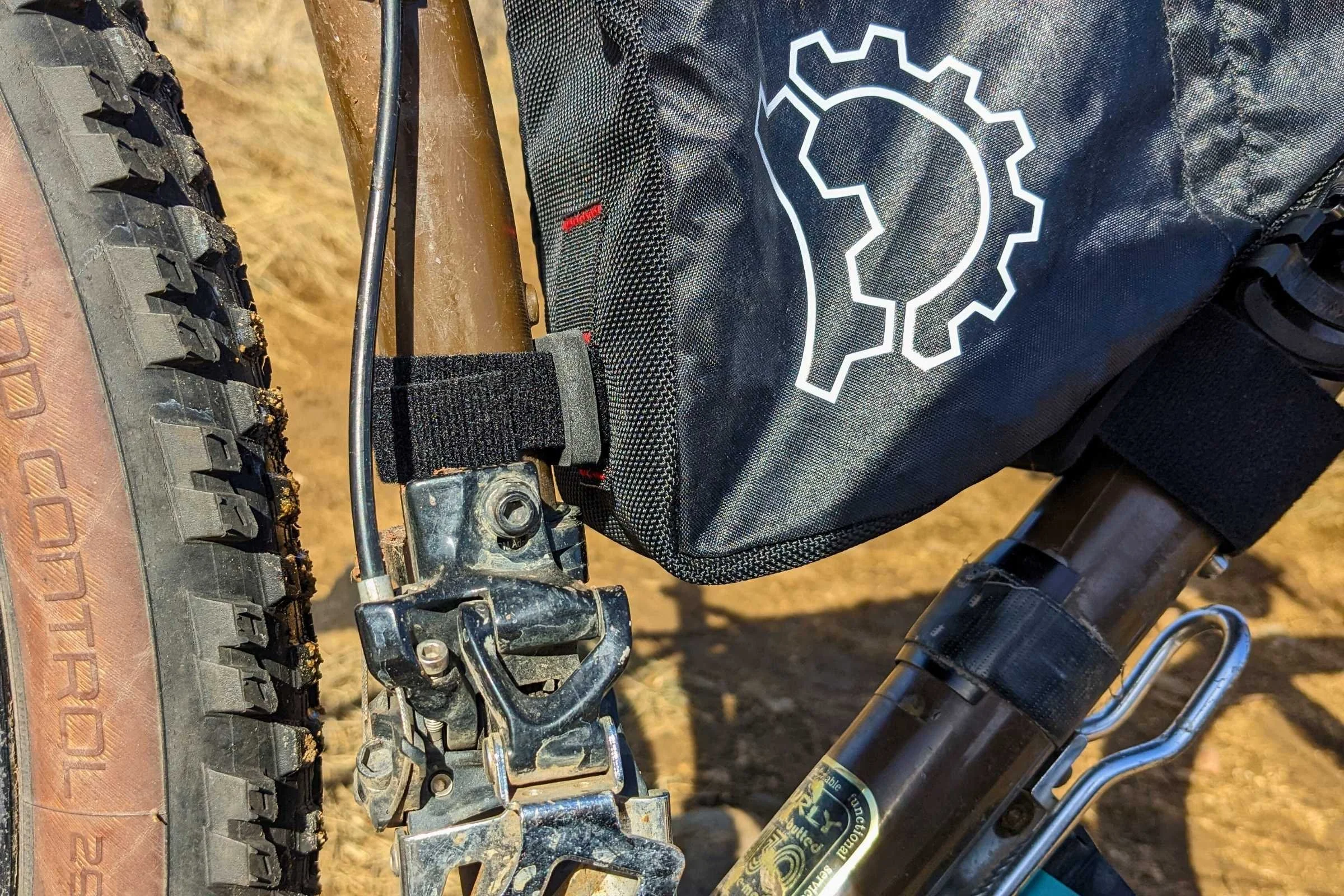   The Revelate bag attaches via Velcro for a secure and stable attachment to your bike.  