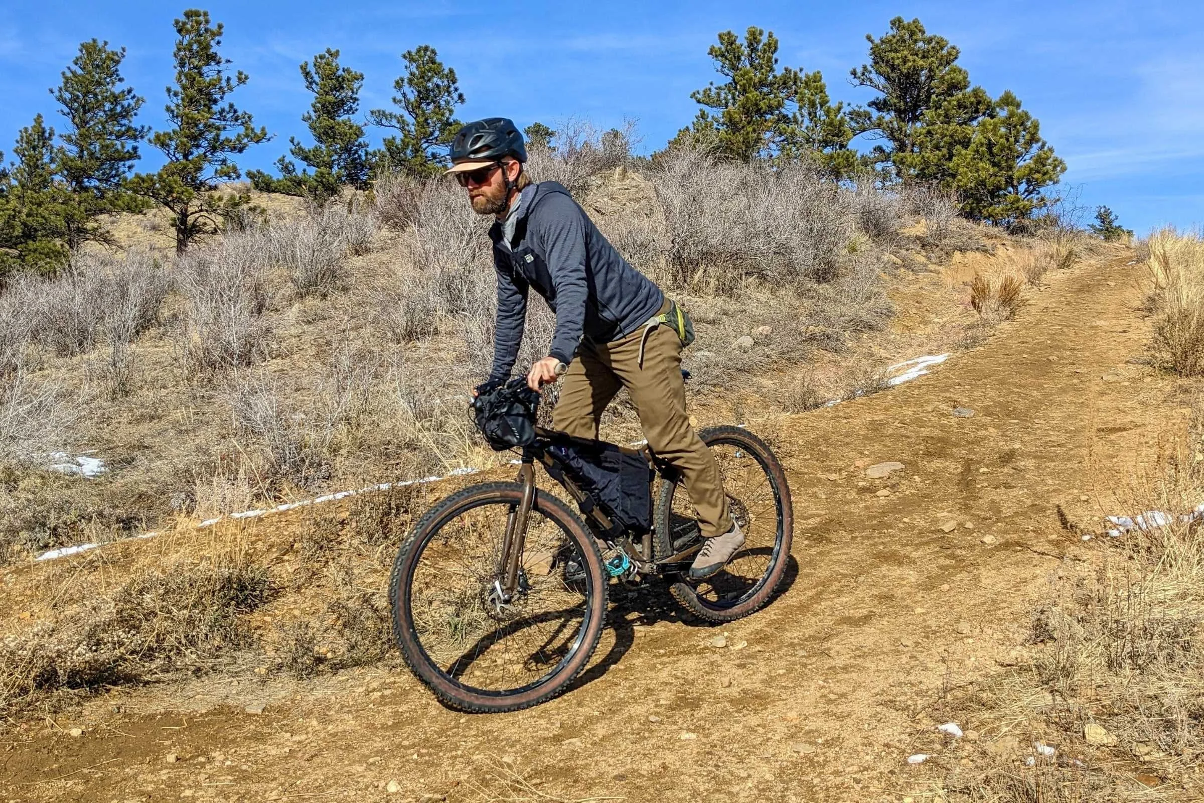   The author riding with the Revelate Design Ranger full frame bag mounted on his bike.  