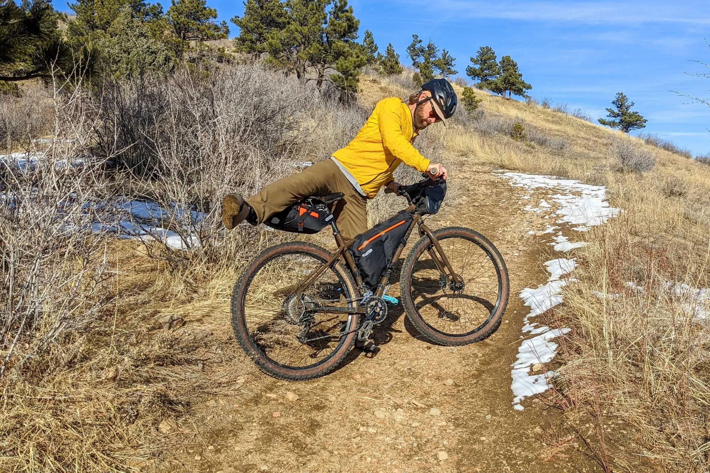   The author, Sam Schild, riding a Colorado Front range mountain bike trail with the ORTLIEB Frame-Pack bike bag in Colorado.  