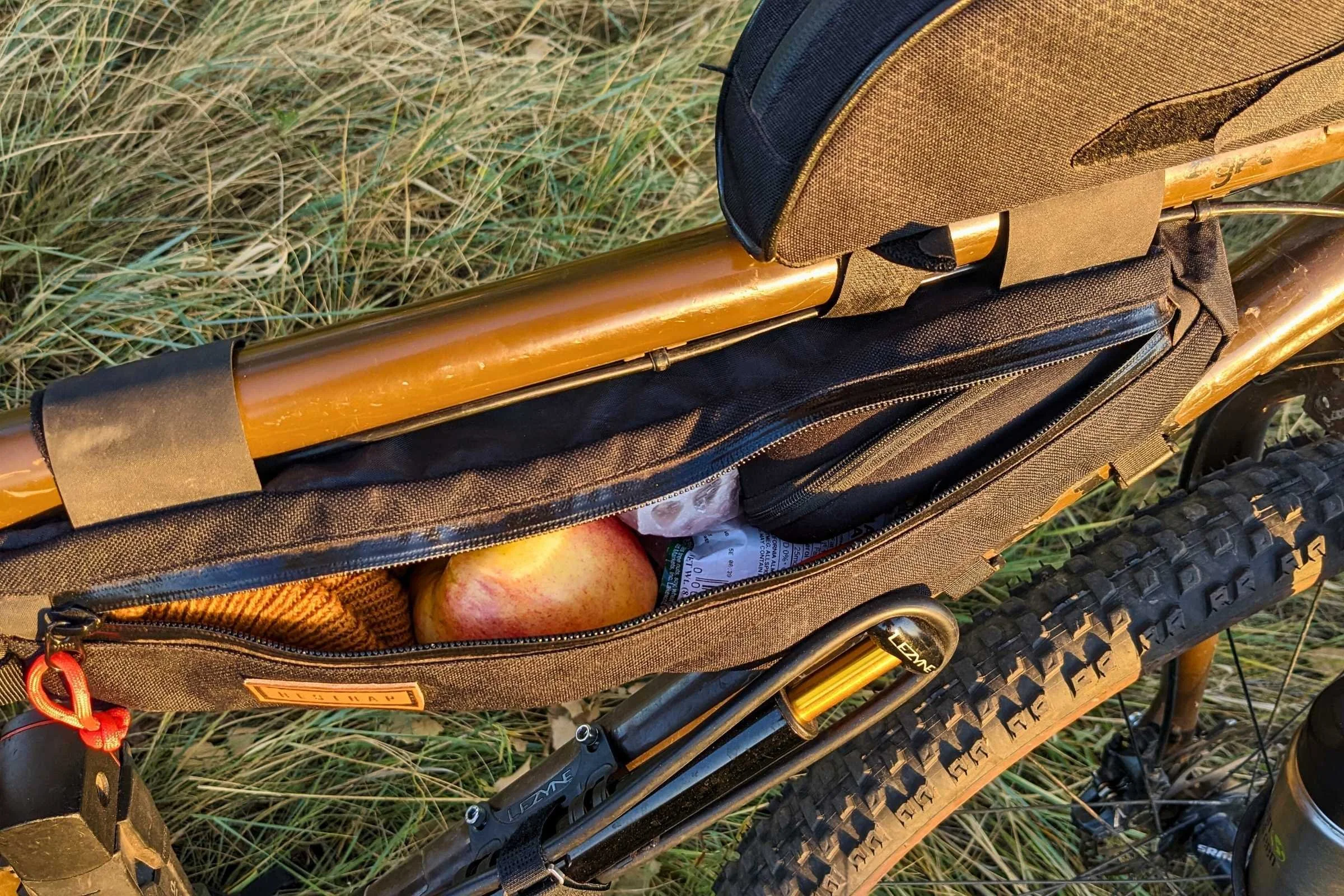   The Restrap frame bag has easy to access pockets that can be operated with one hand while riding a bike.  