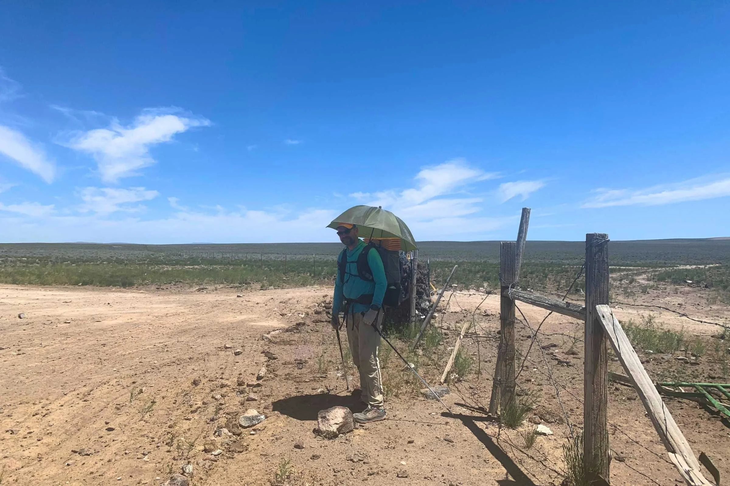   Treeline Review writer Mike Unger using the Rain Walker umbrella as a sun umbrella on the Oregon Desert Trail thru-hike.  