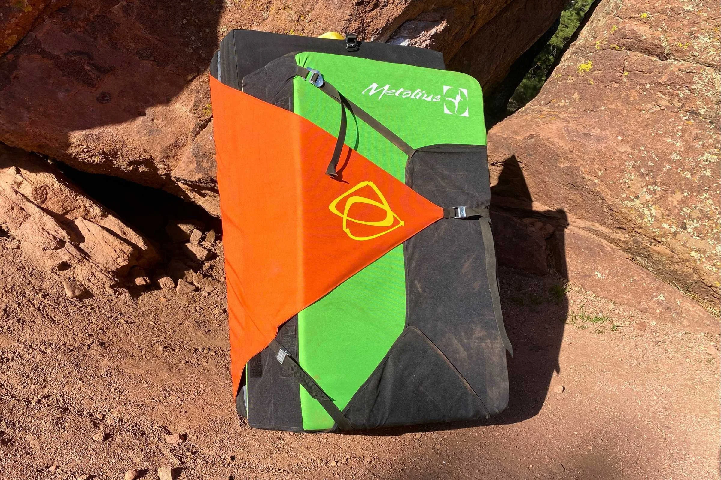   The Superhero can easily carry an additional pad. Here, the Superhero (on the outside) is carrying a smaller Metolius pad.  