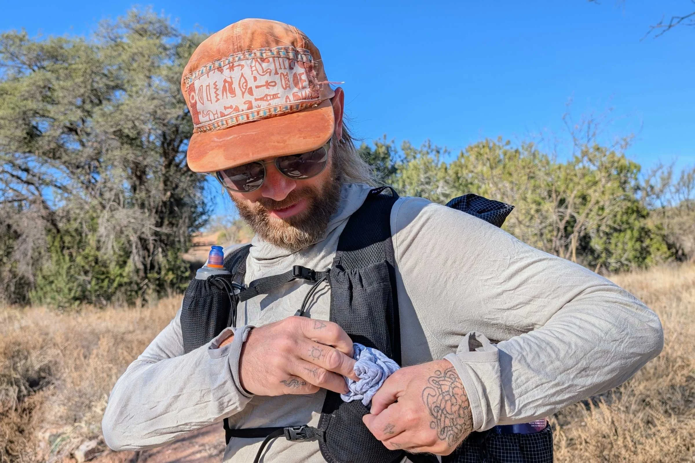   Close-up of the Pa’lante Packs V2 with Joey Straps showing front pocket storage and access in use.  
