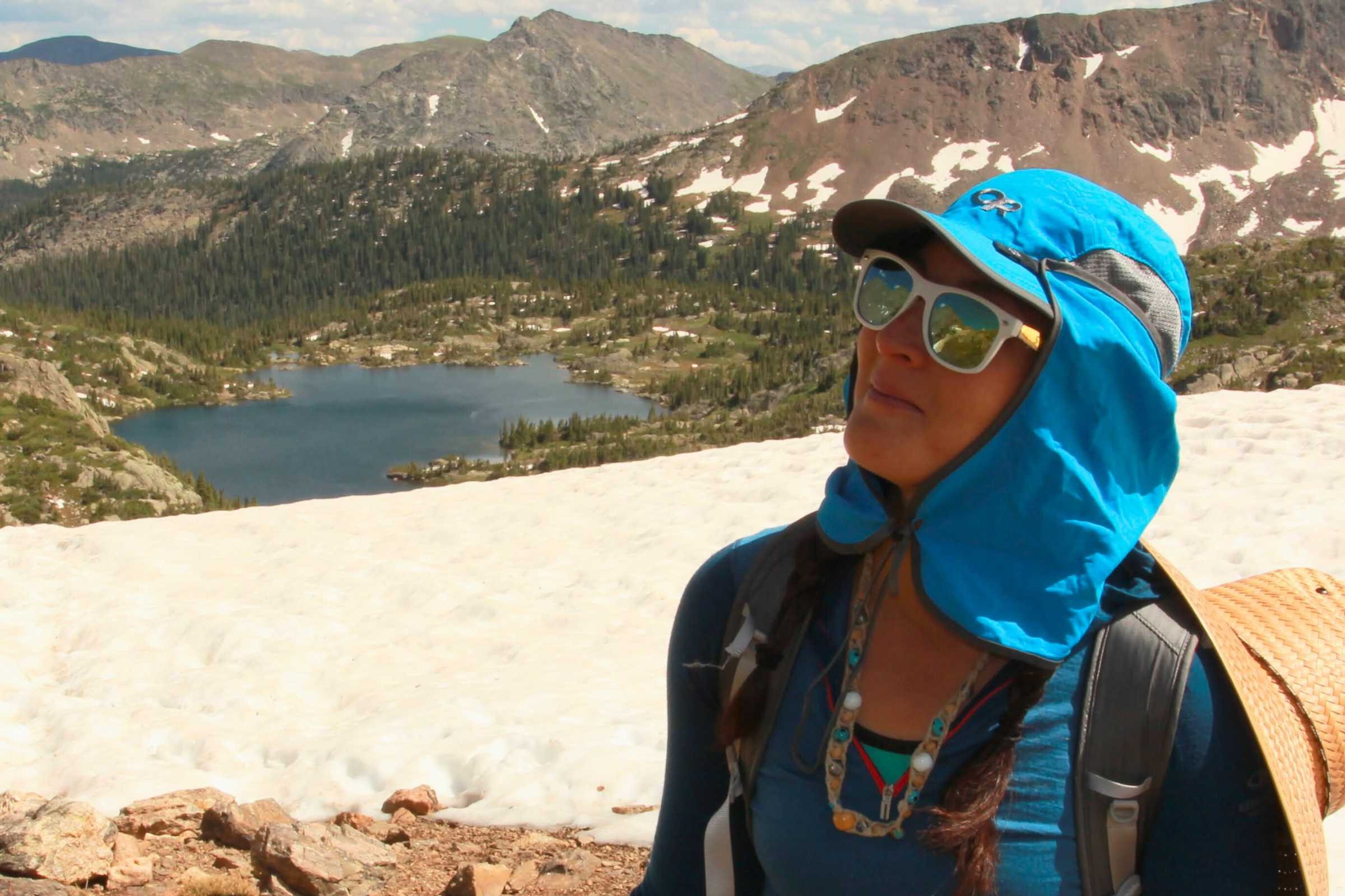   Treeline Review editor Liz Thomas in the OR Sun Runner Cap on a high-altitude hike in Colorado.   Photo by John Carr.  