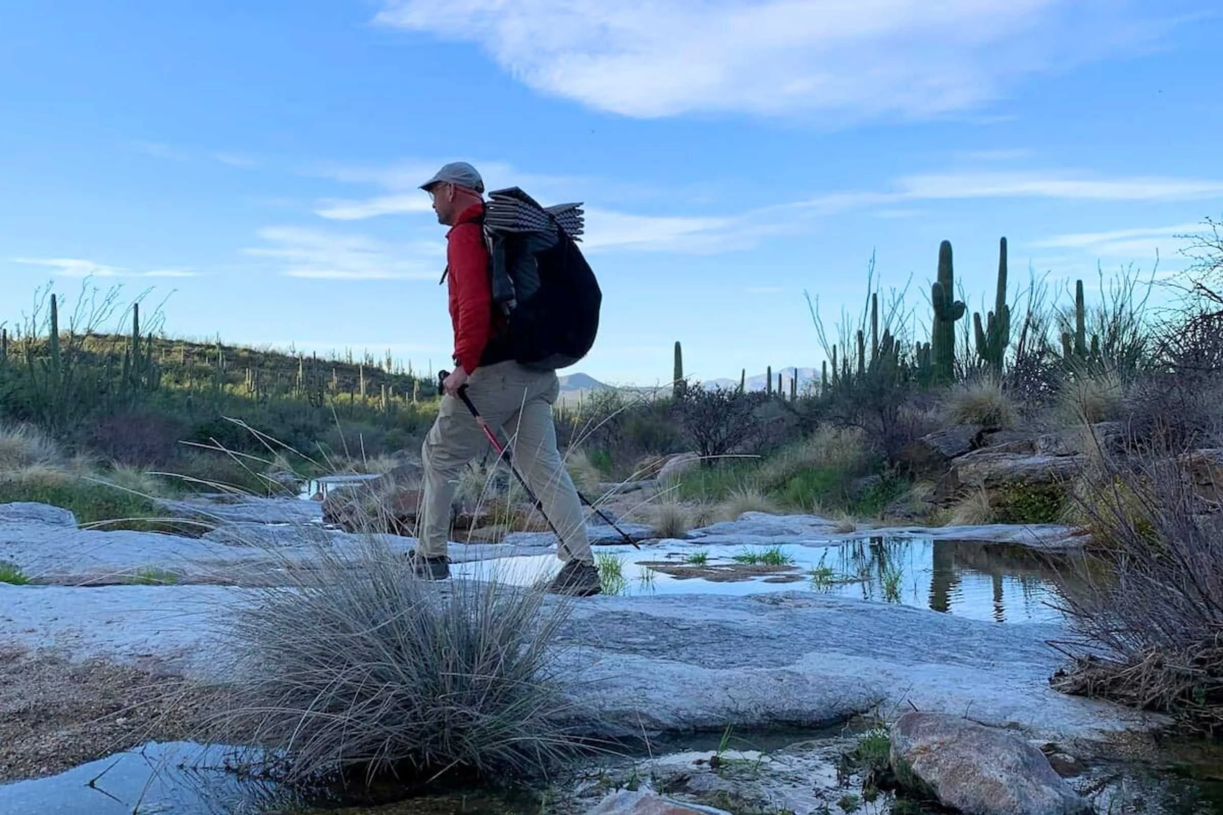   Man hiking in the Outdoor Research Sun Runner Cap  