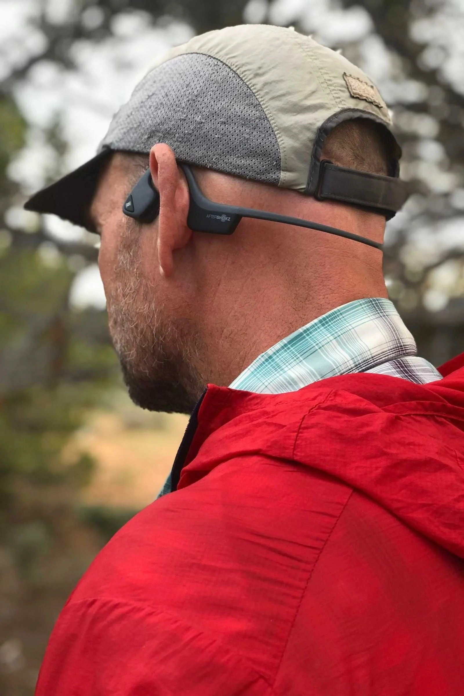   Rear-side view of main wearing Outdoor Research Sun Runner Cap  