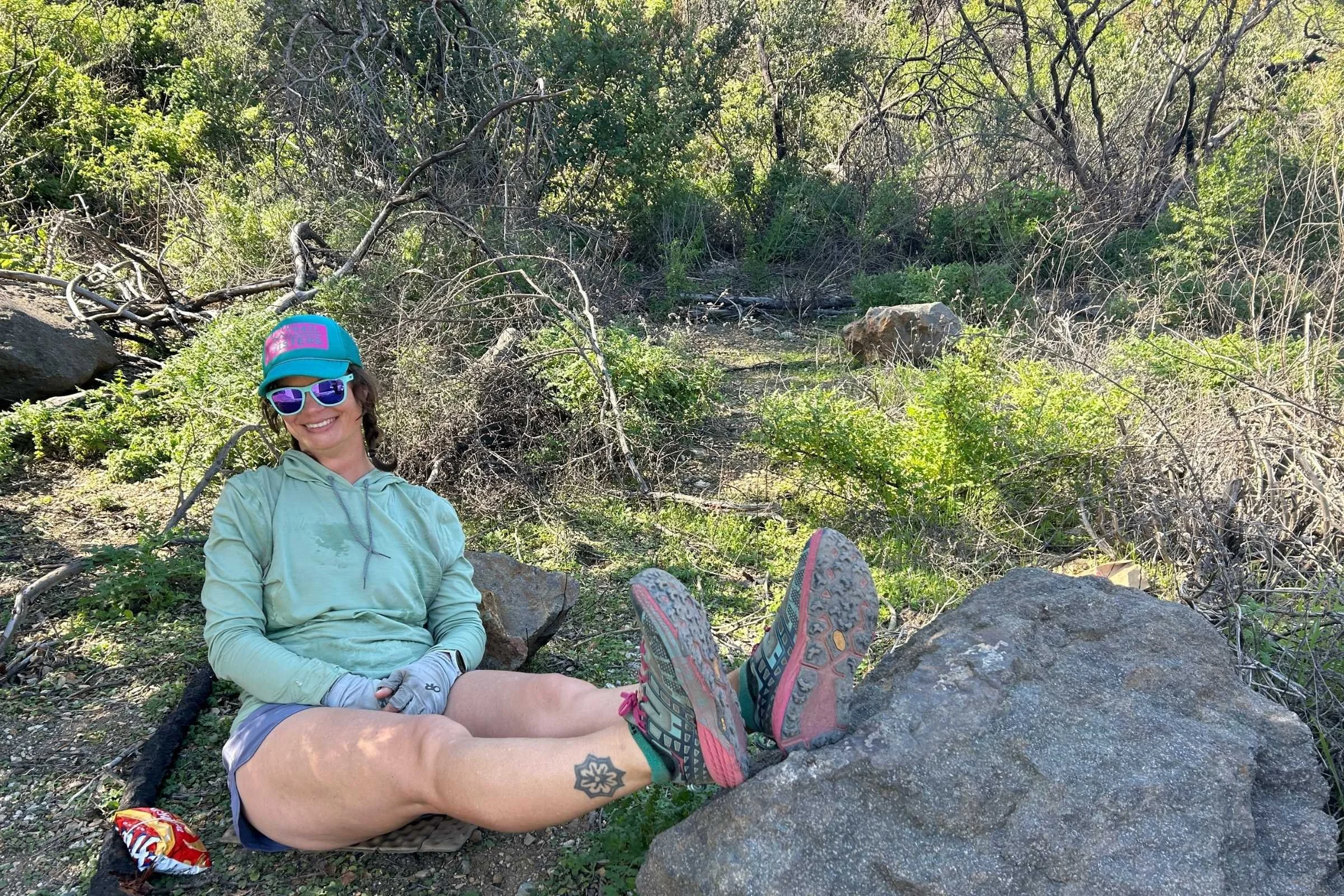   Hiker relaxing trailside in Injinji Trail Midweight socks  