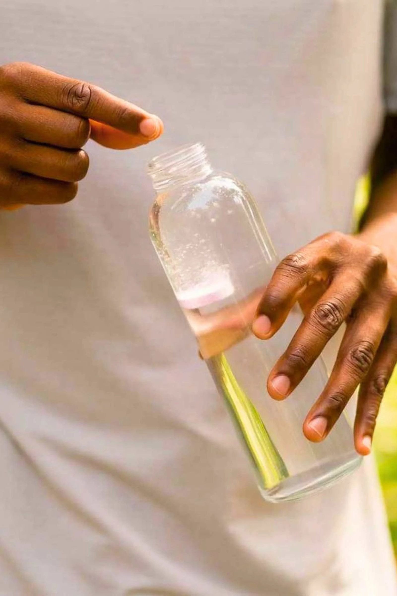   Adding Nuun Hydration Sport ot a bottle of water  