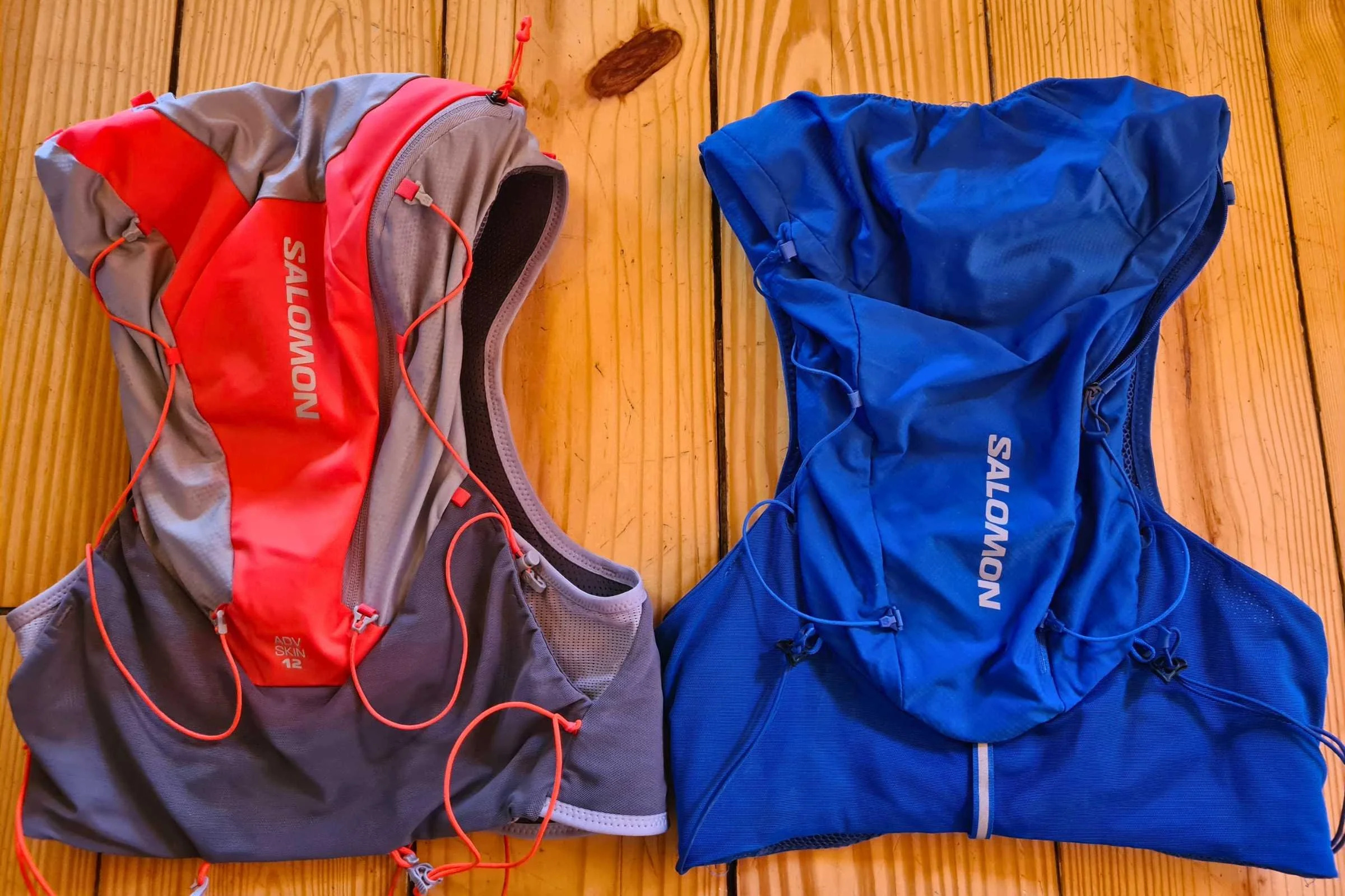   The newest Salomon Adv Skin 12 running vest shown next to previous version for size and design comparison  
