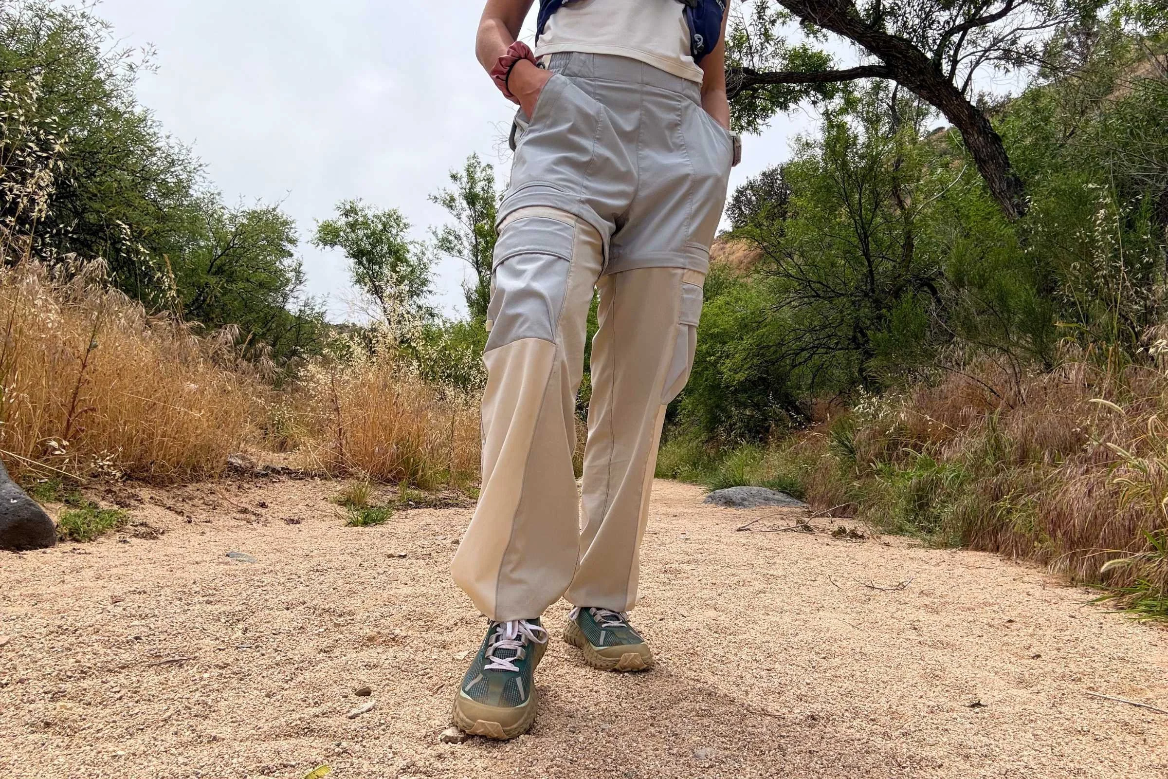   Front view of hiker wearing norda 001 trail running shoes on desert trail  