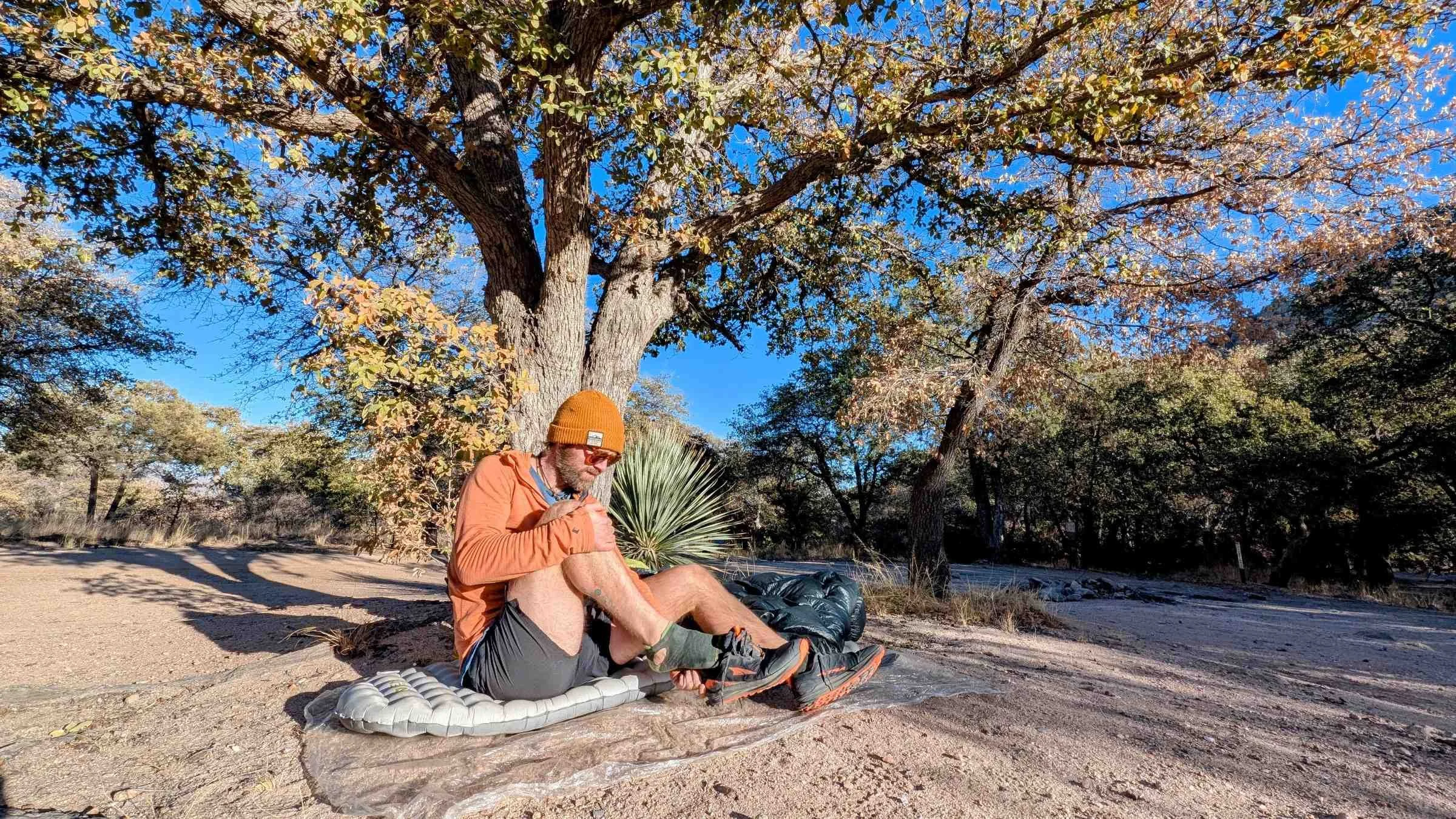   Treeline Review writer Sam Schild backpacking in the Altra Lone Peak 9+  
