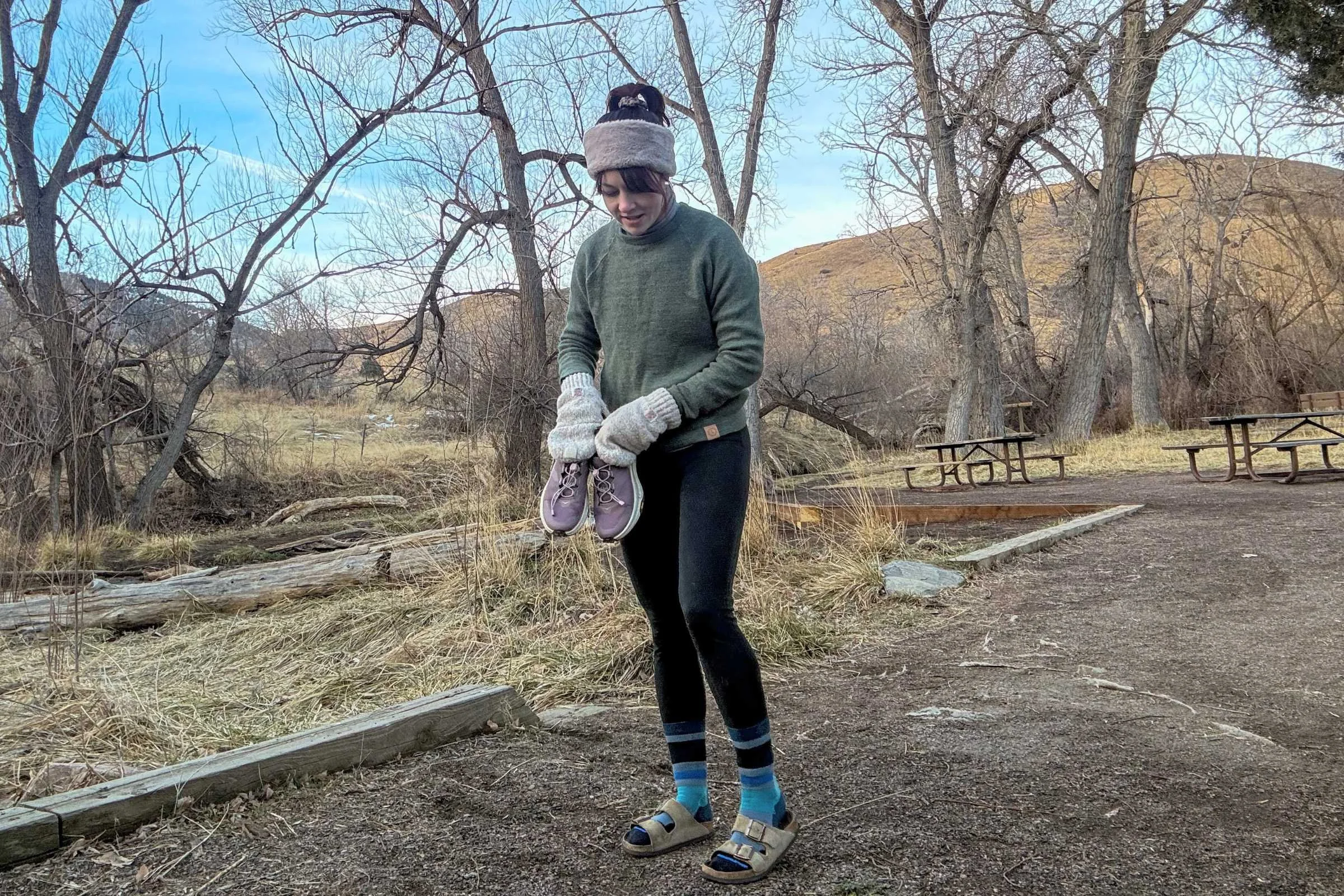   Person wearing Birkenstock Arizona Soft Footbed sandals outdoors with socks  