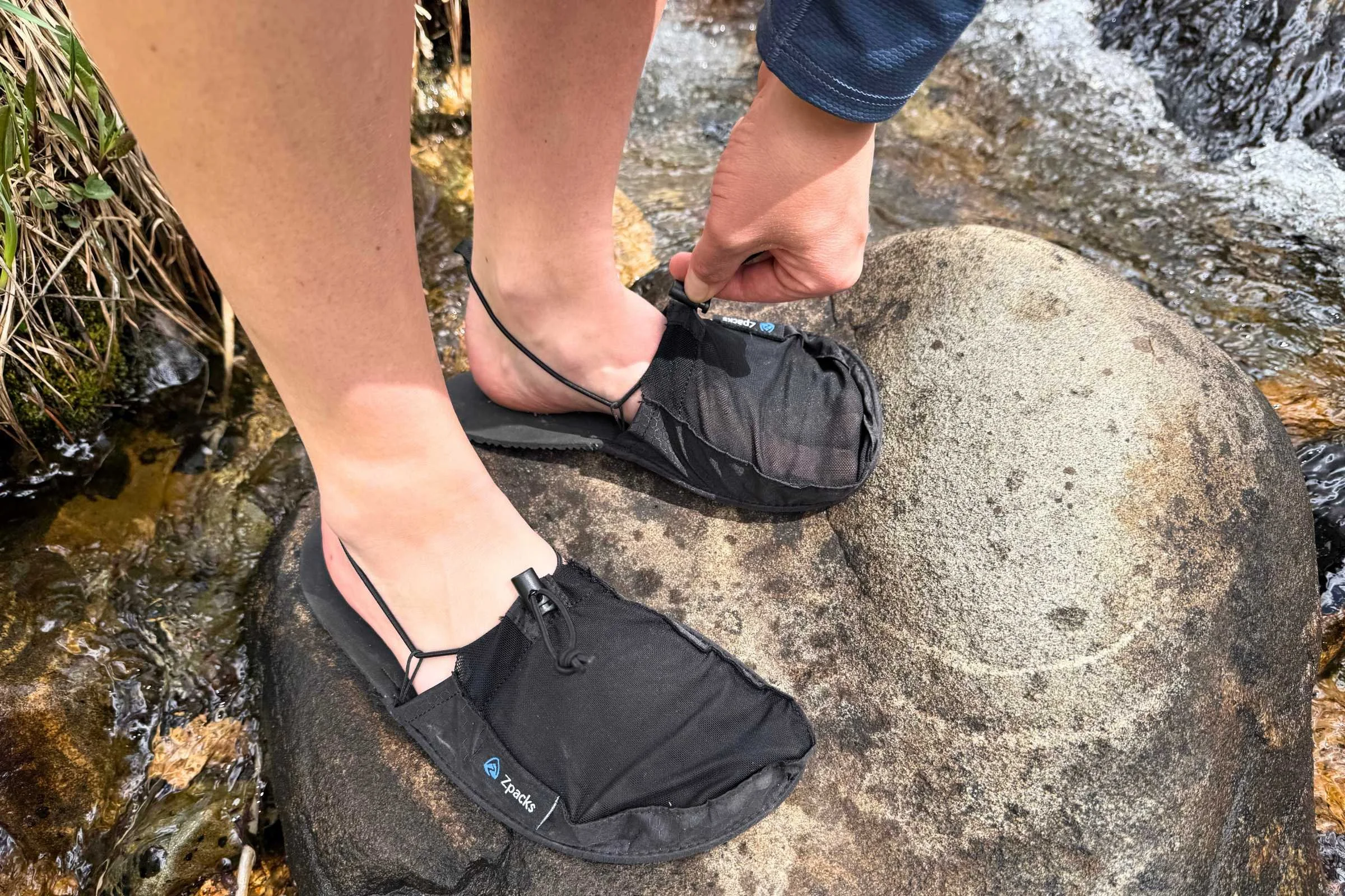   The Zpacks Ultralight Camp Shoes have a simple and effective drawcord adjustment to keep them securely on.   Photo by Stasia Stockwell.  